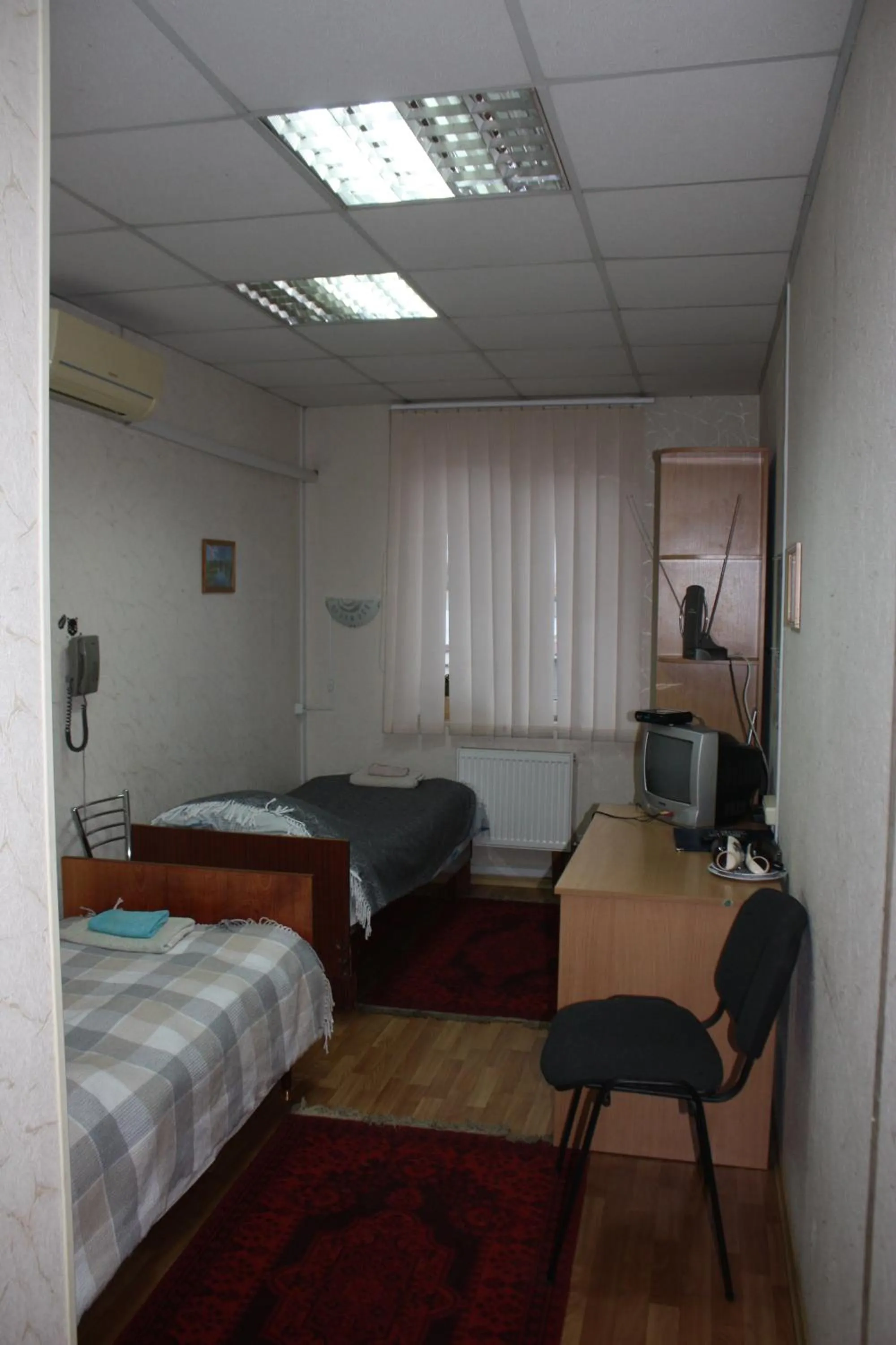 Seating area, Bed in motel Pid Strihoyu
