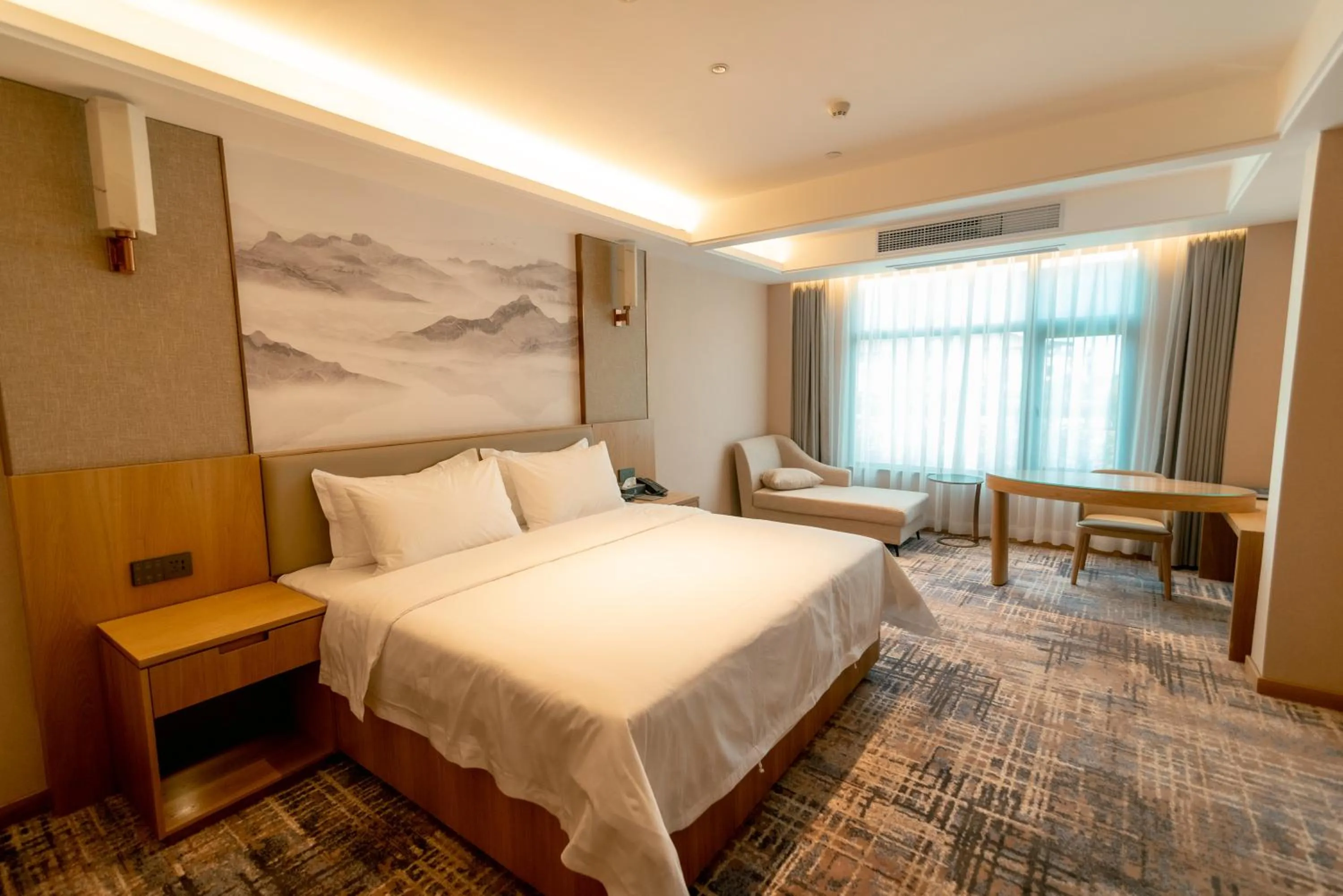 Bed in ShengDa International Hotel
