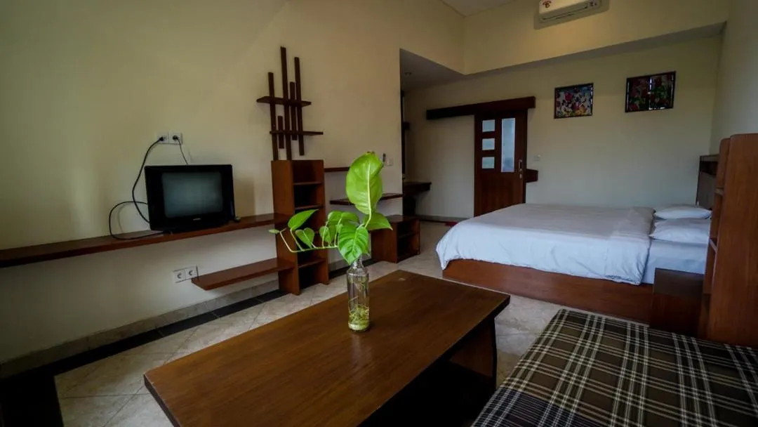 Communal lounge/ TV room, Bed in The Janan Villa