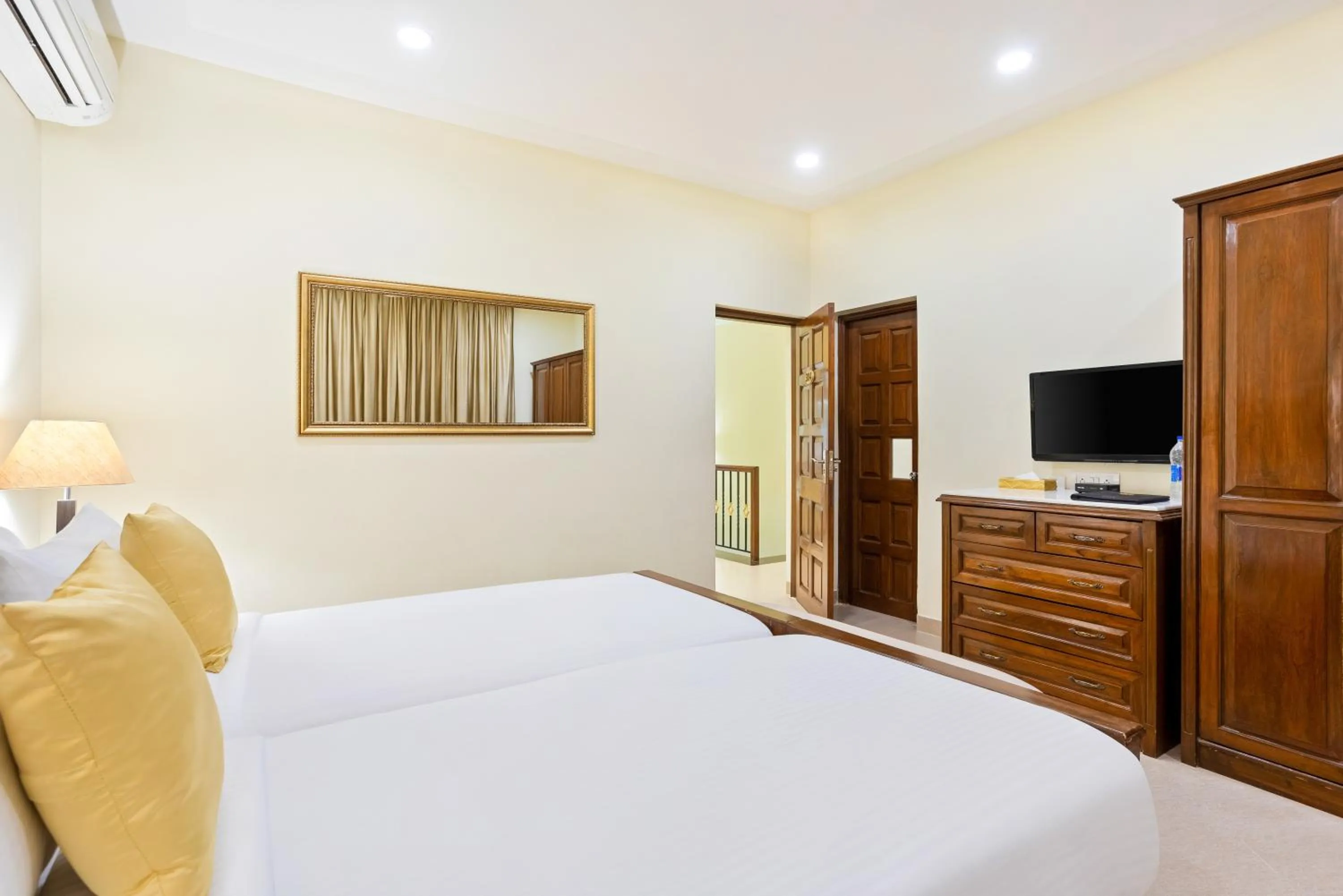 Bedroom, Bed in Seashell Suites and Villas- Candolim Goa
