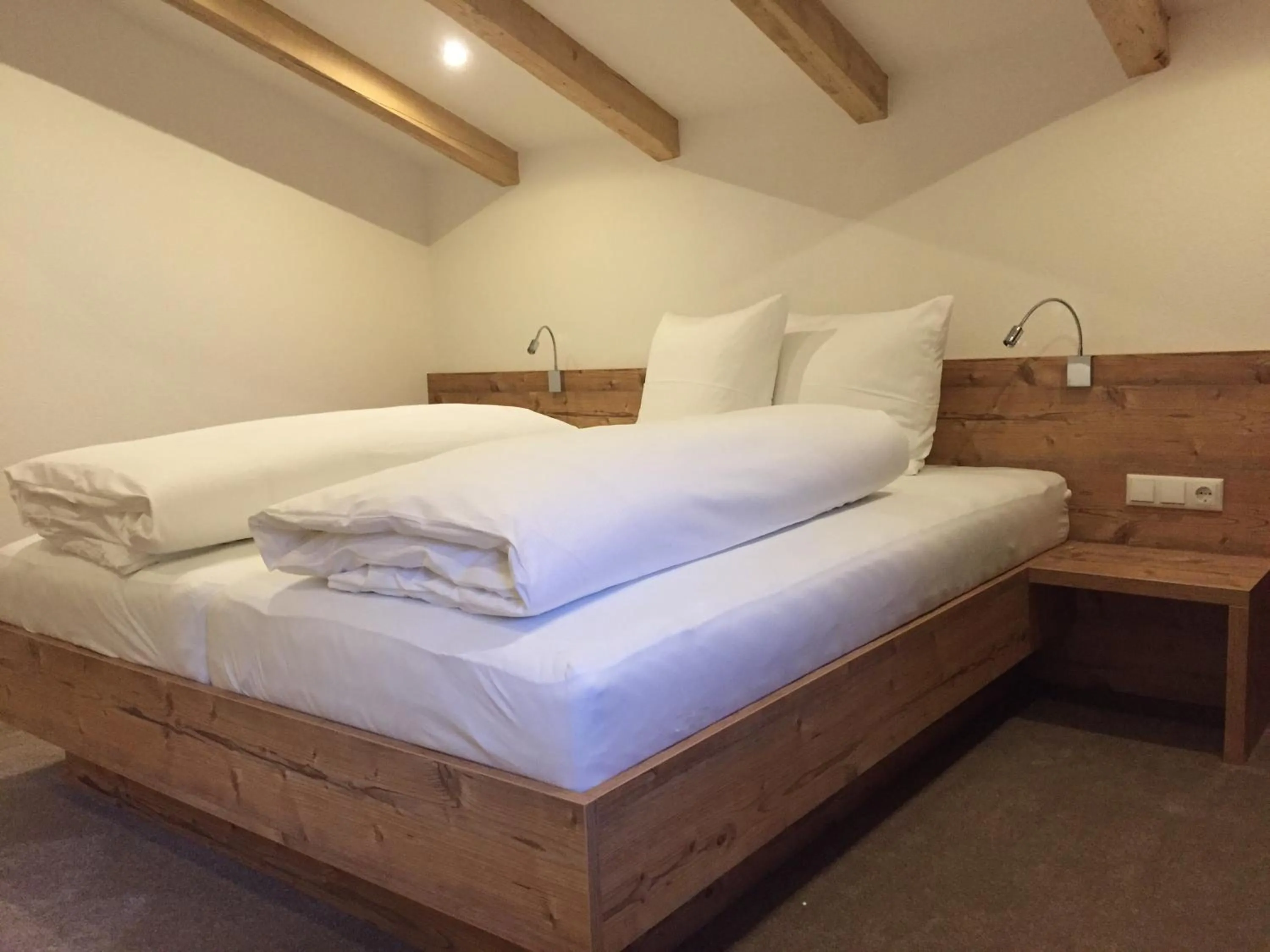 Bed in Ferienwohnungen Bailom