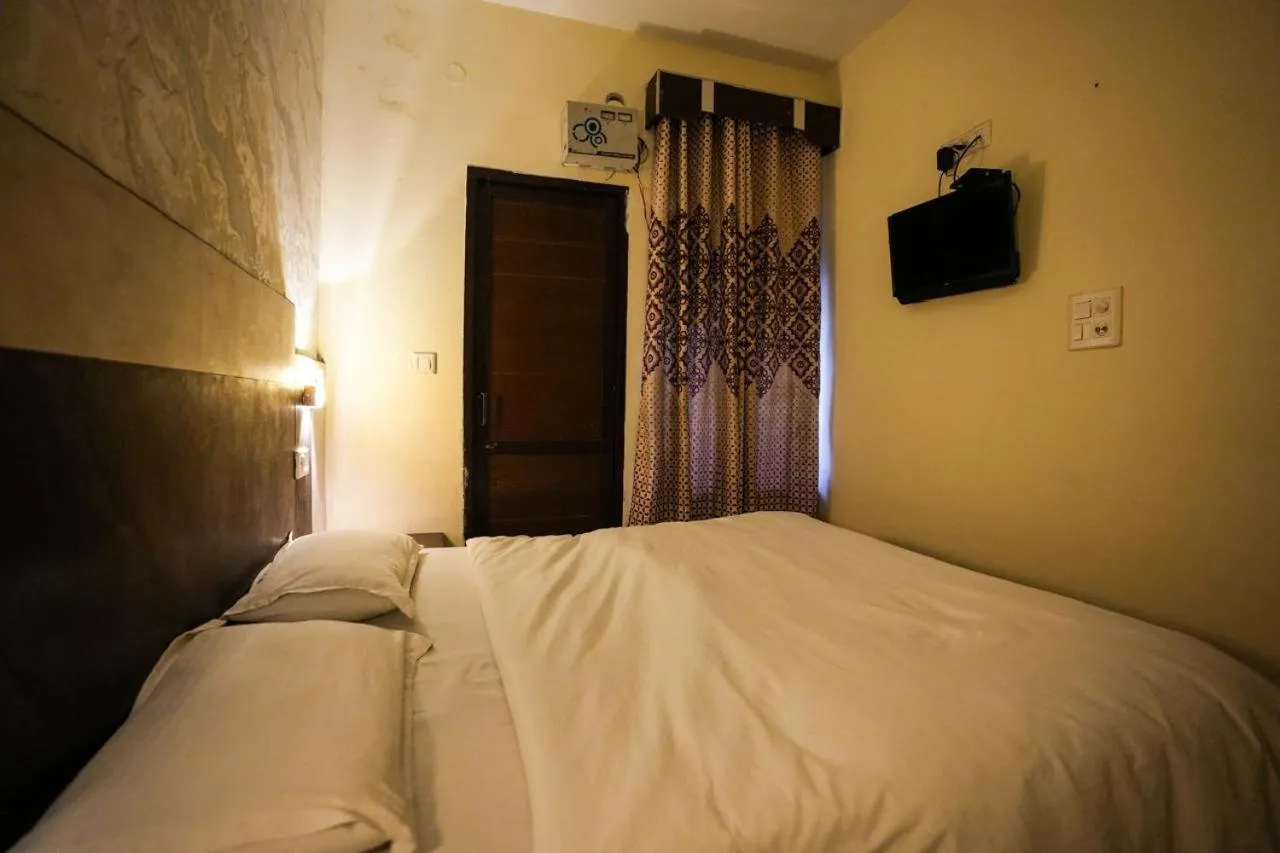 Bed in Hotel Blessing Inn