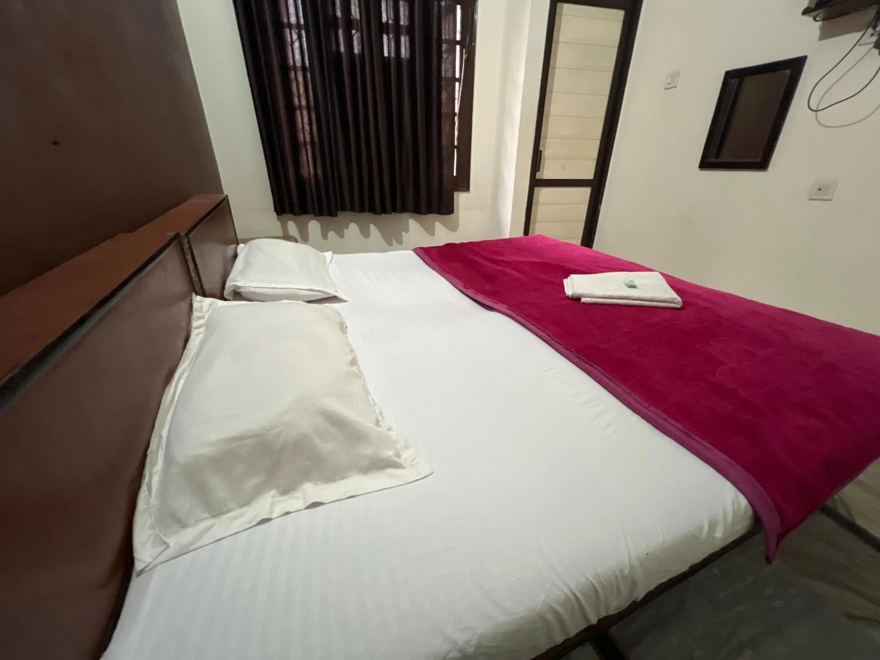 Bed in Hotel Blessing Inn