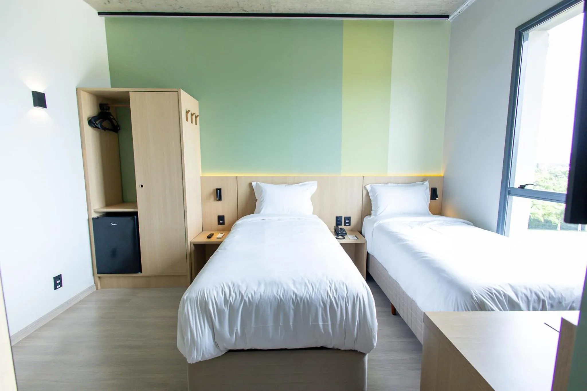 Bed in Liwe Hotels