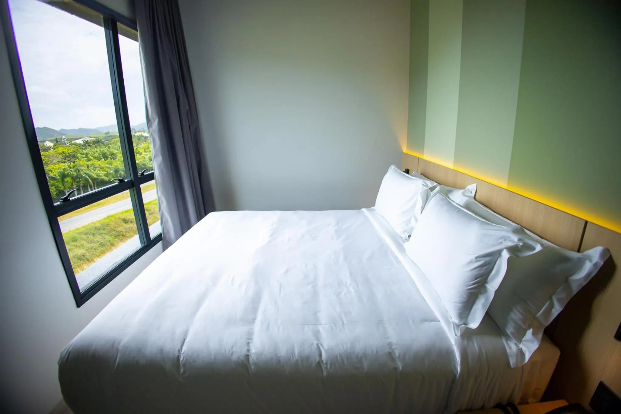 Bed in Liwe Hotels