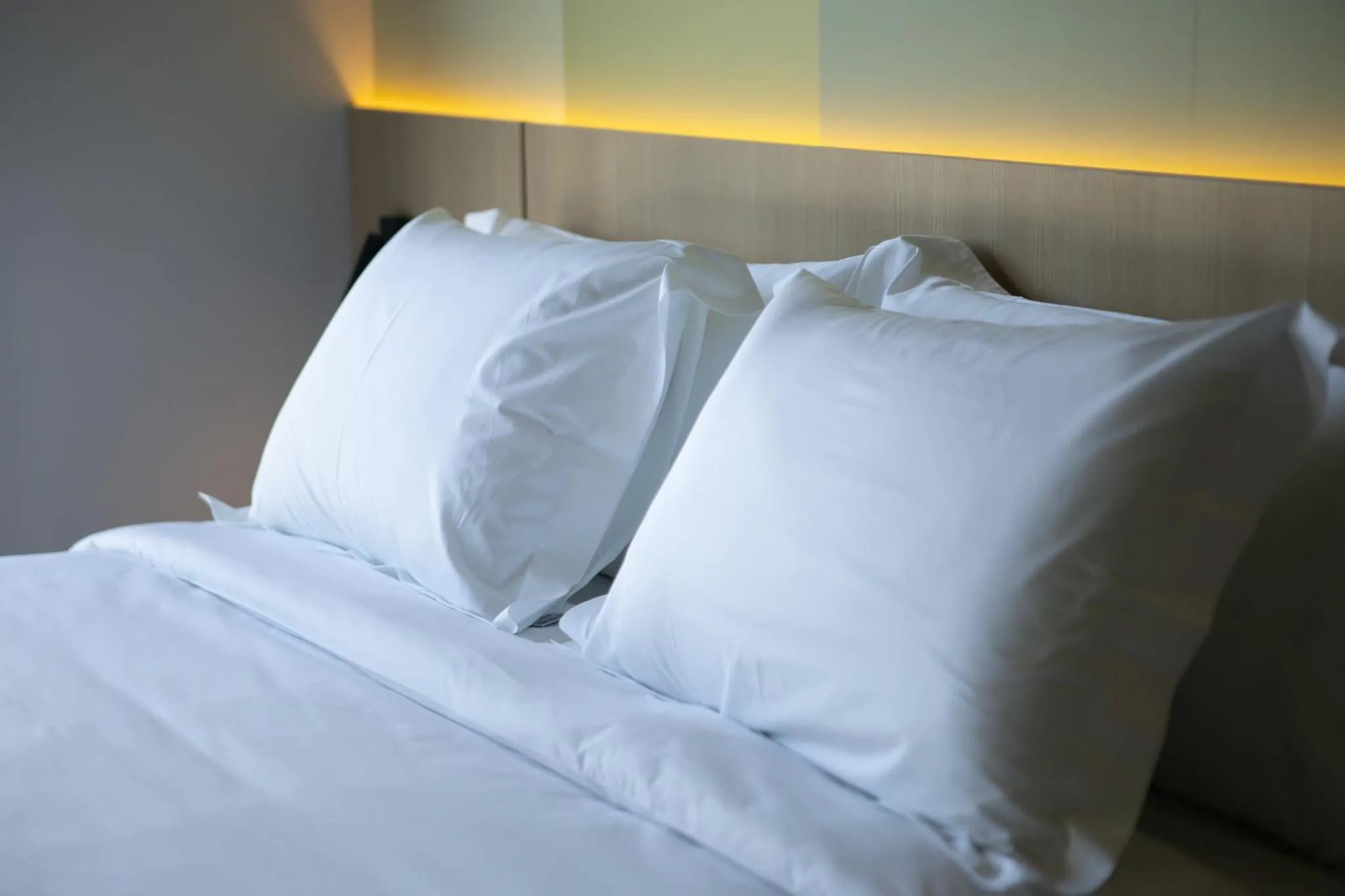 Bed in Liwe Hotels