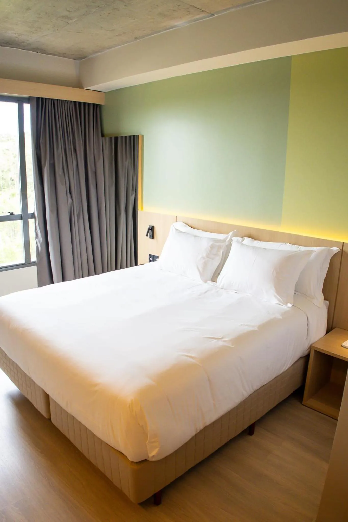 Bed in Liwe Hotels