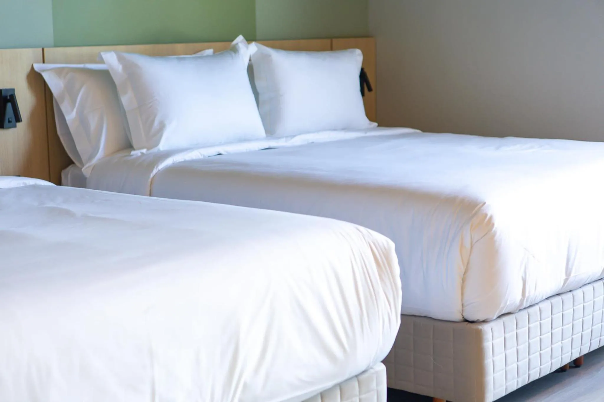 Bed in Liwe Hotels