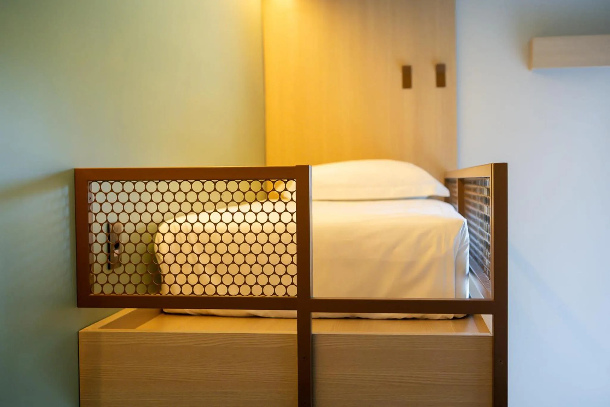 Bed in Liwe Hotels