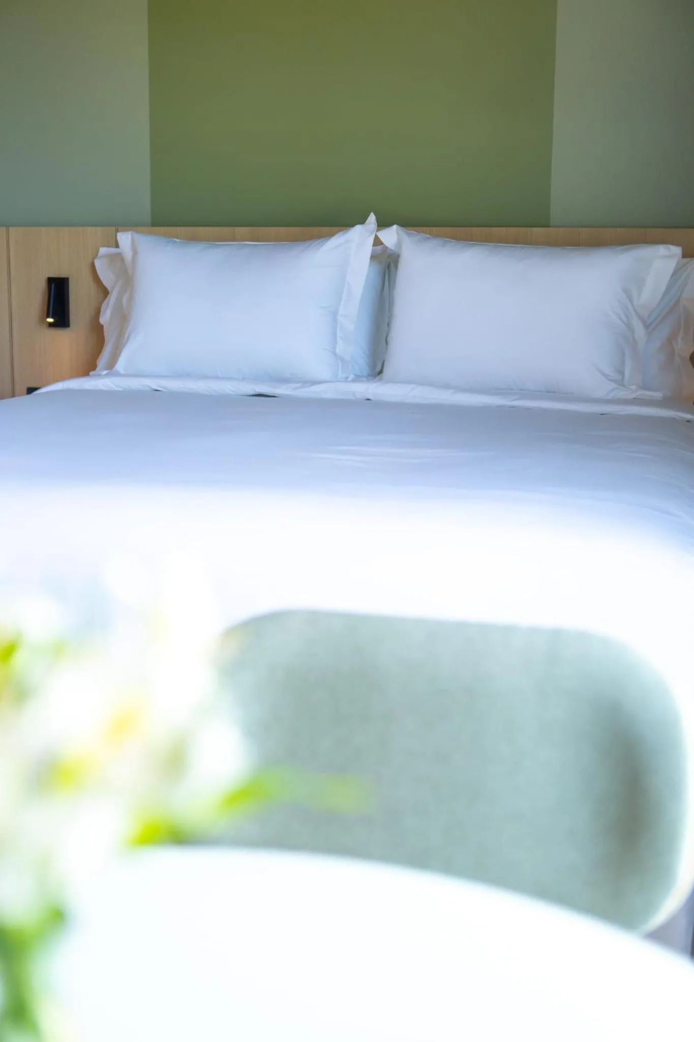 Bed in Liwe Hotels