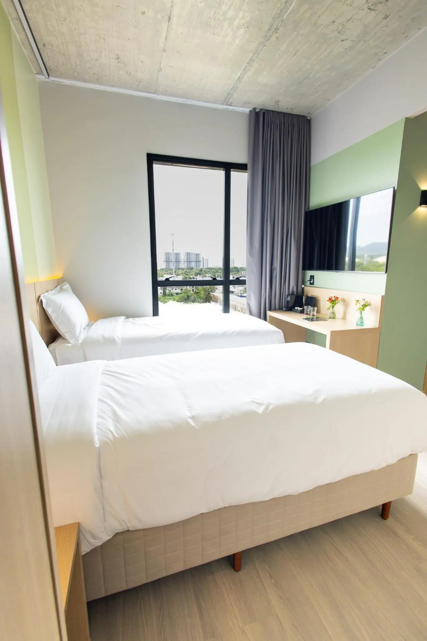 Bed in Liwe Hotels