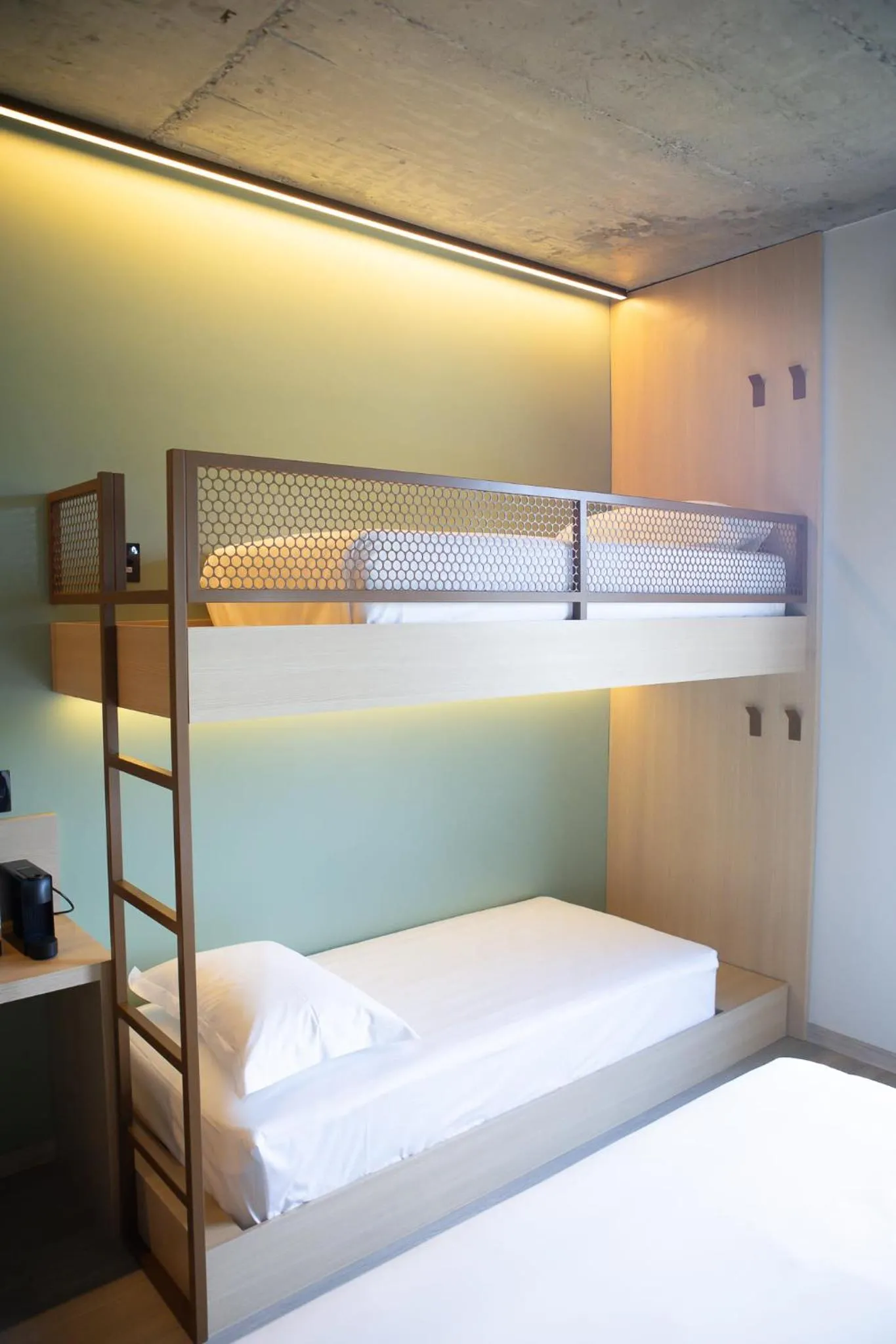 Bed in Liwe Hotels