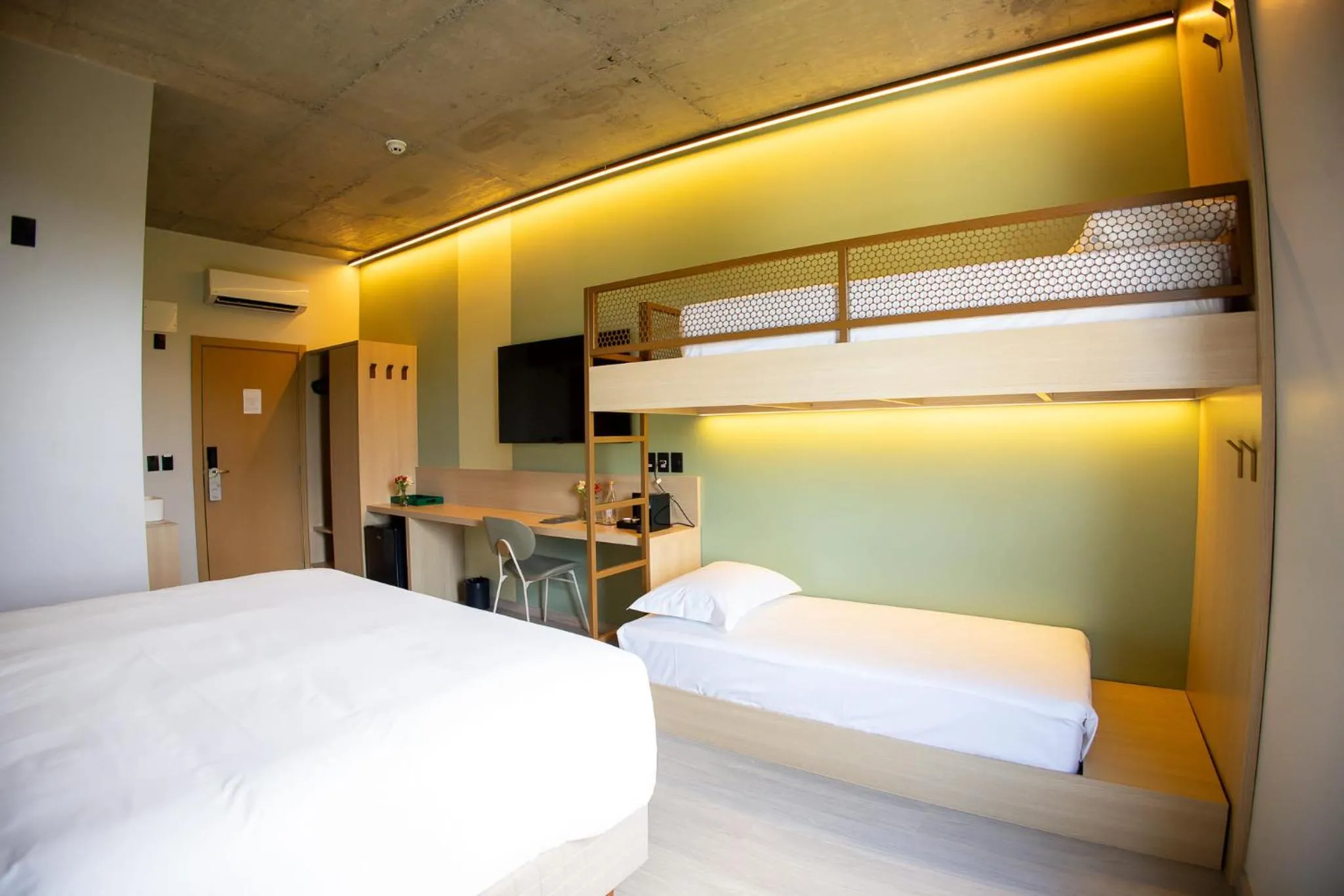 Bed in Liwe Hotels