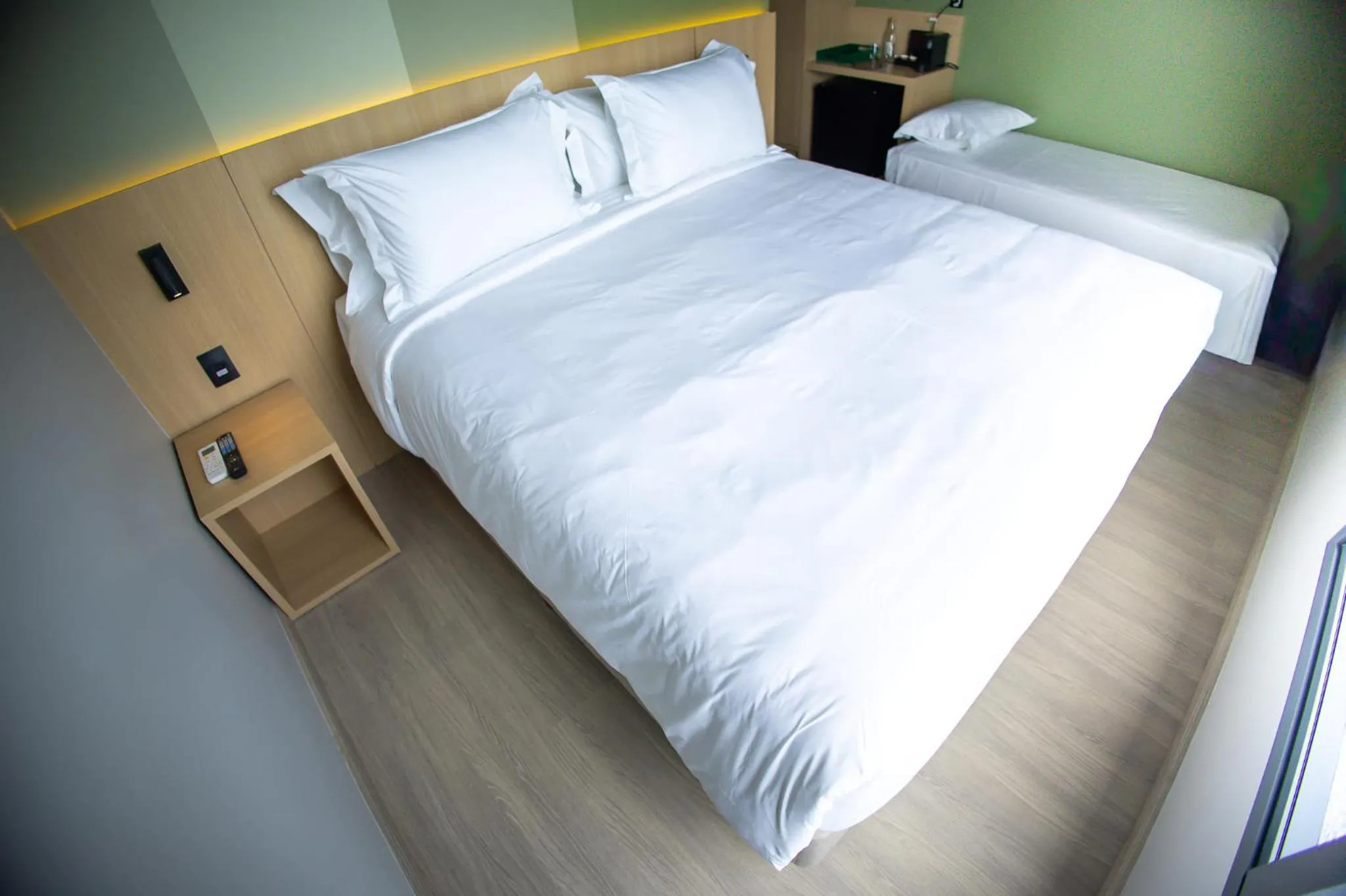Bed in Liwe Hotels