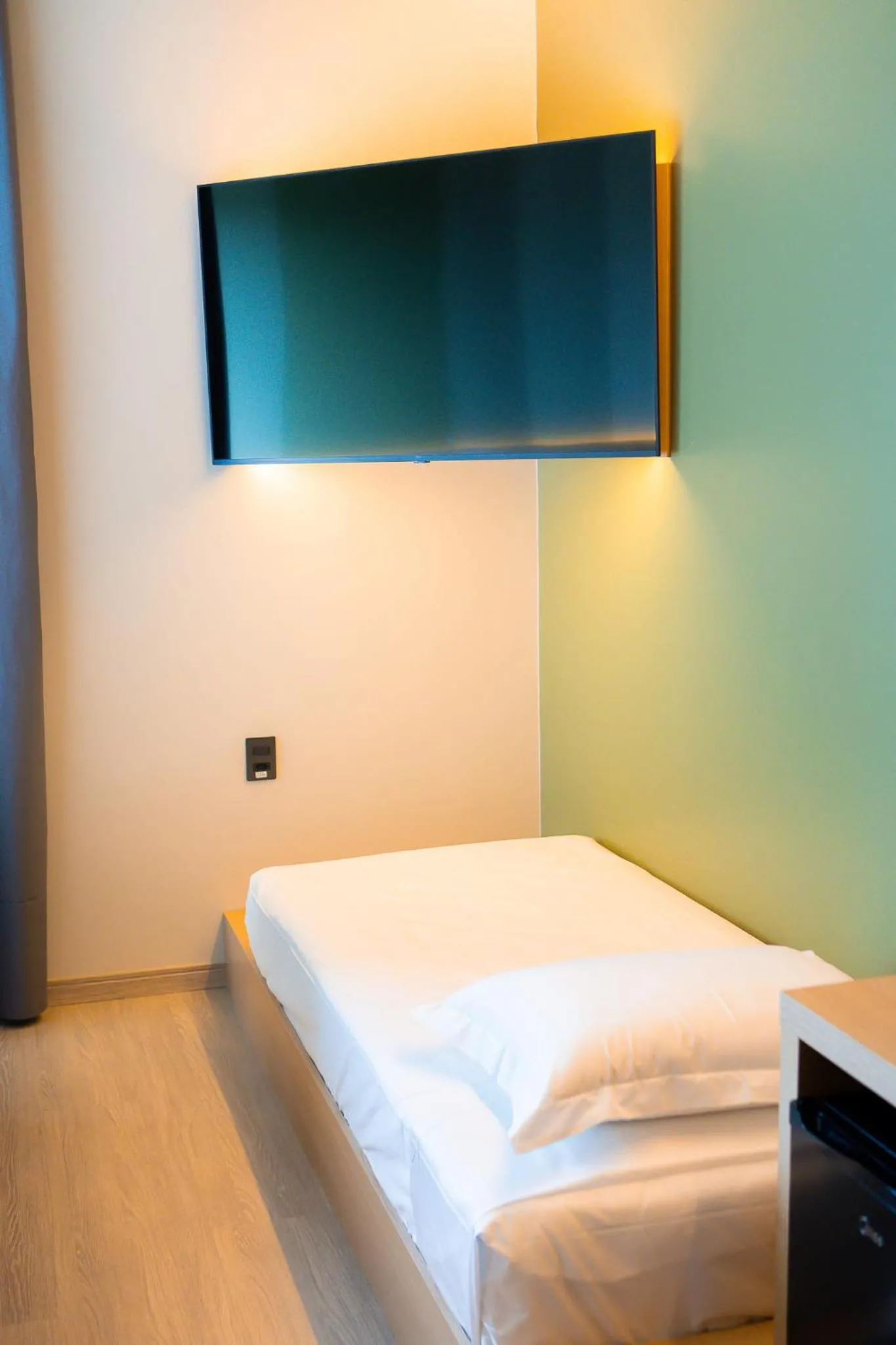 Bed in Liwe Hotels