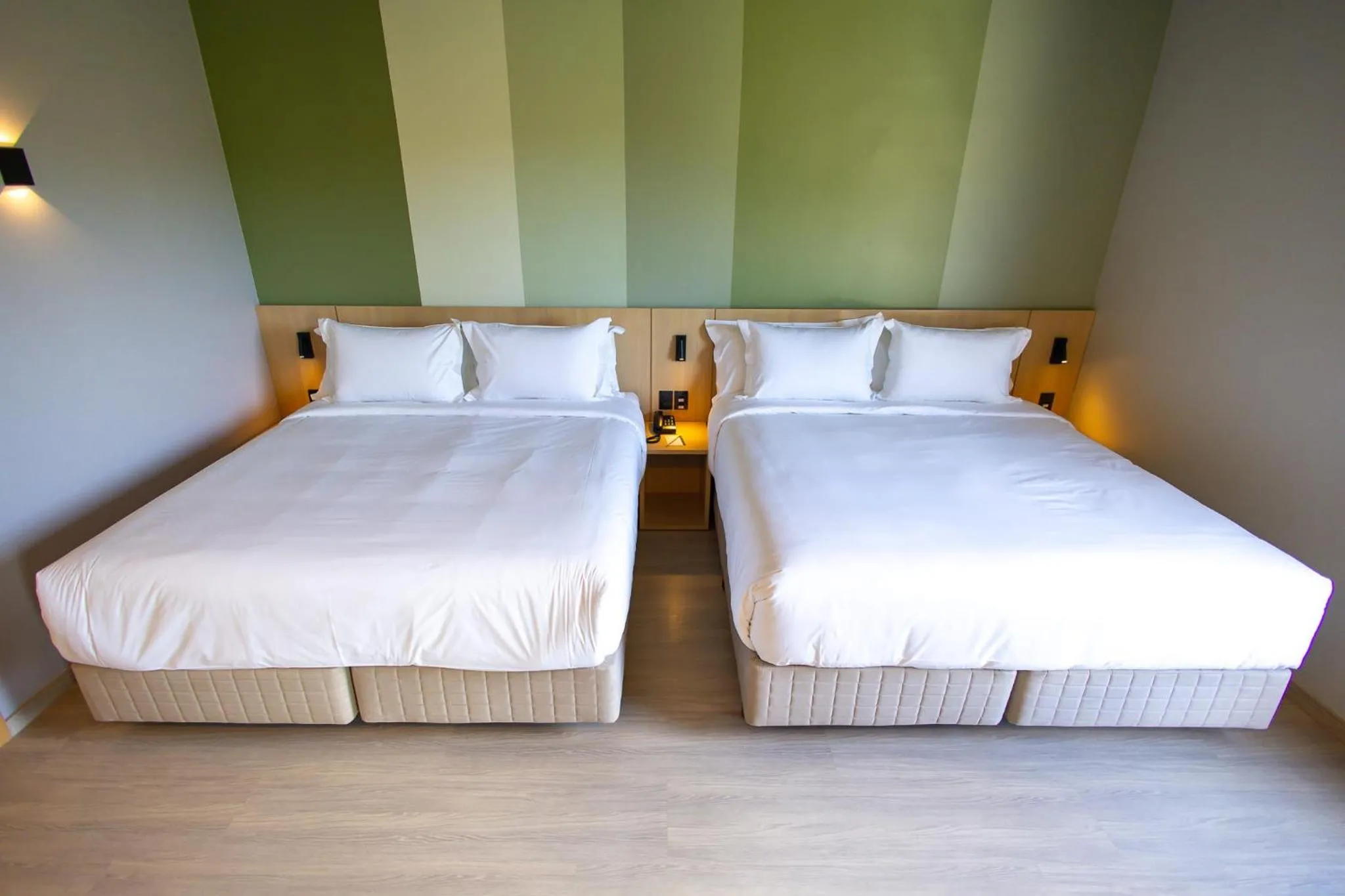 Bed in Liwe Hotels