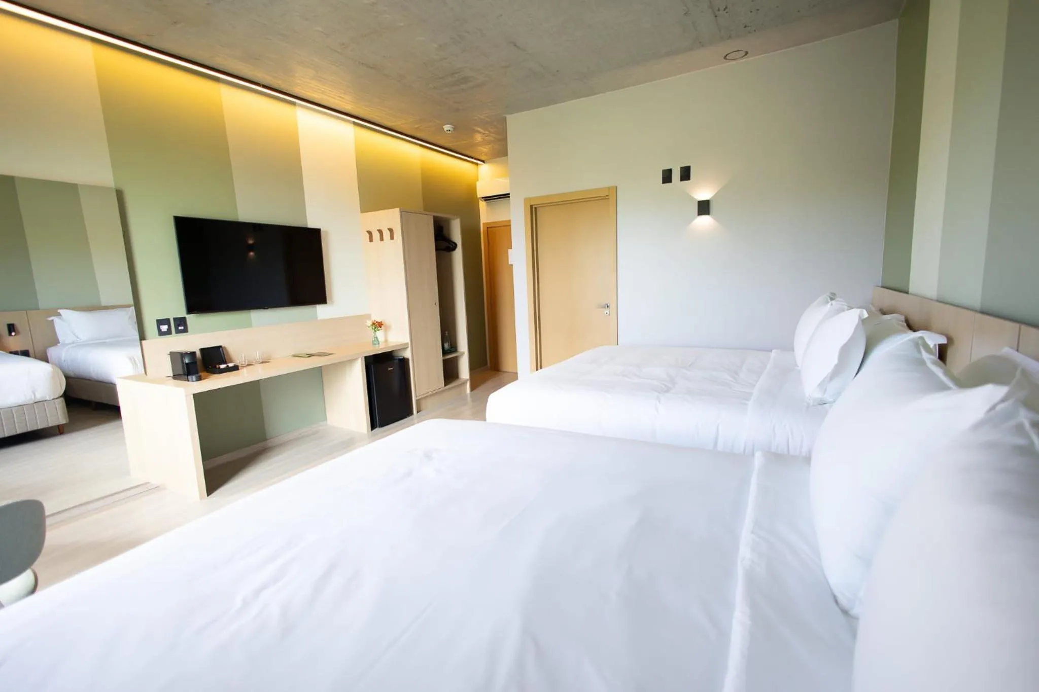 Bed in Liwe Hotels