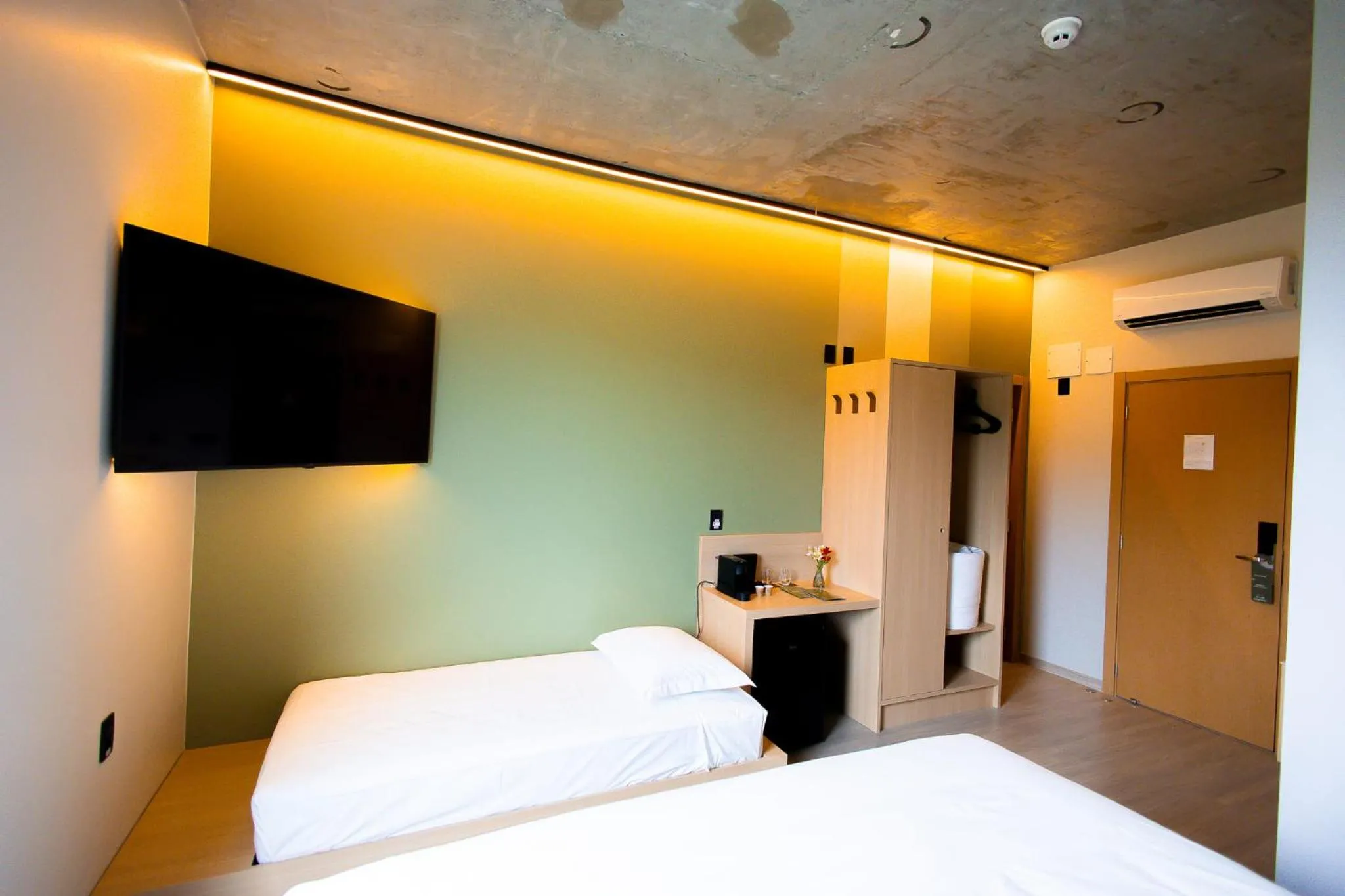 Bed in Liwe Hotels