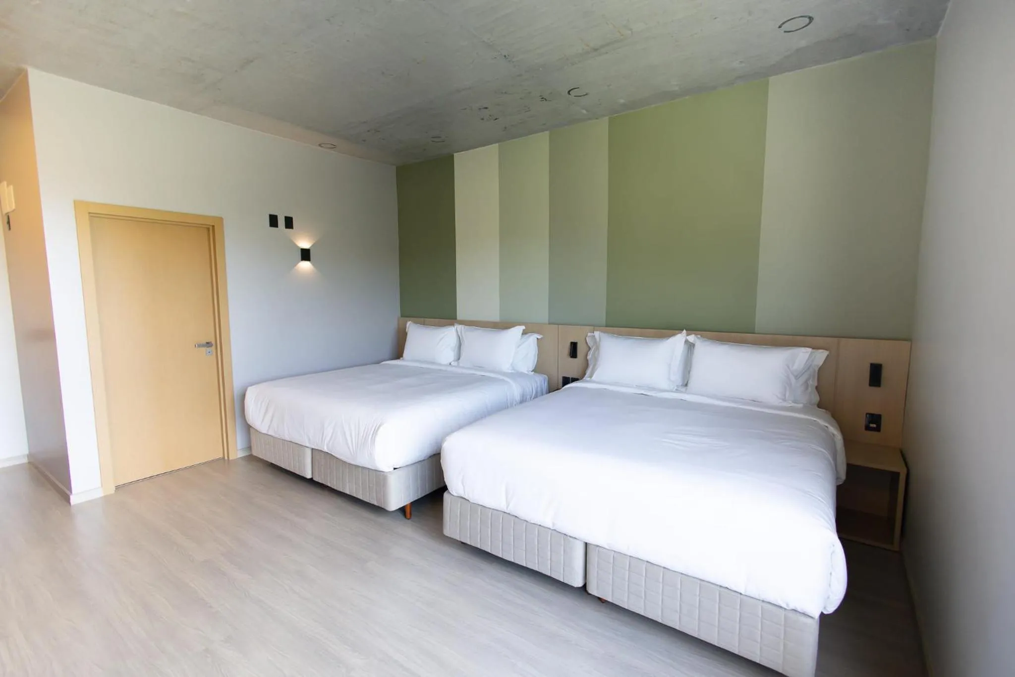 Bed in Liwe Hotels
