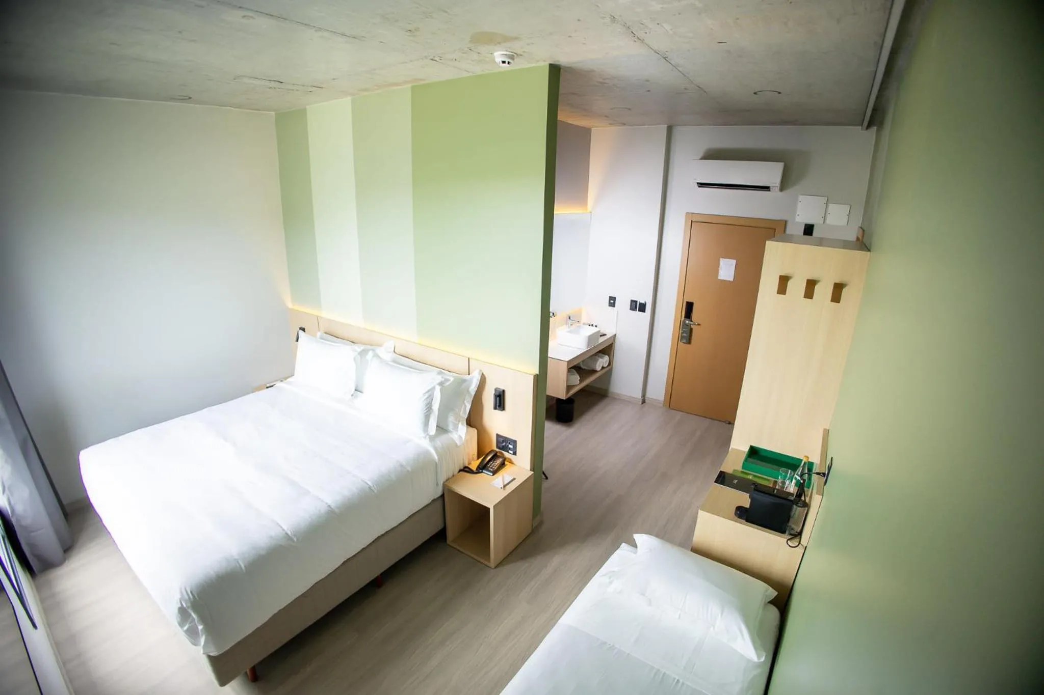Bed in Liwe Hotels