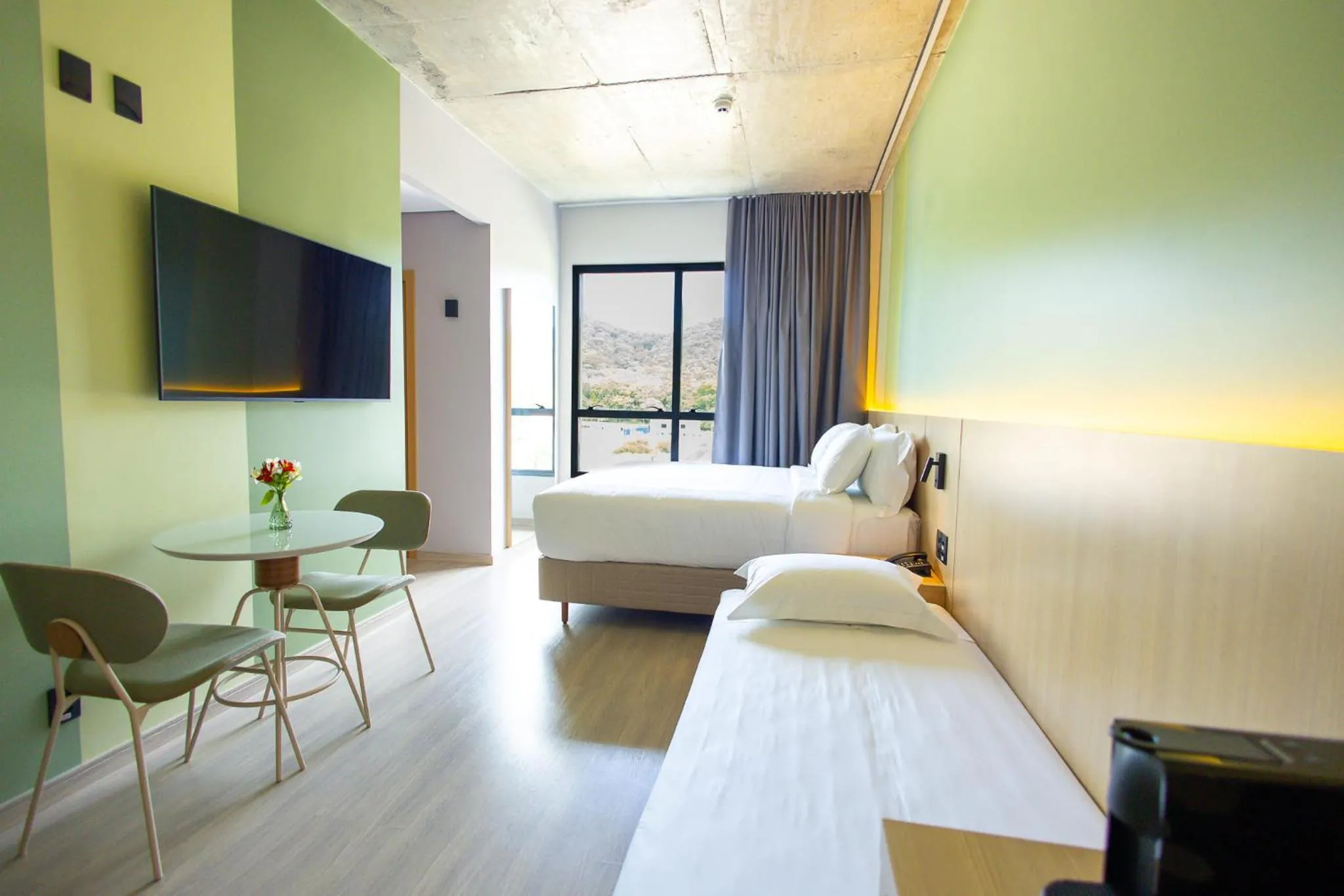 Bed in Liwe Hotels