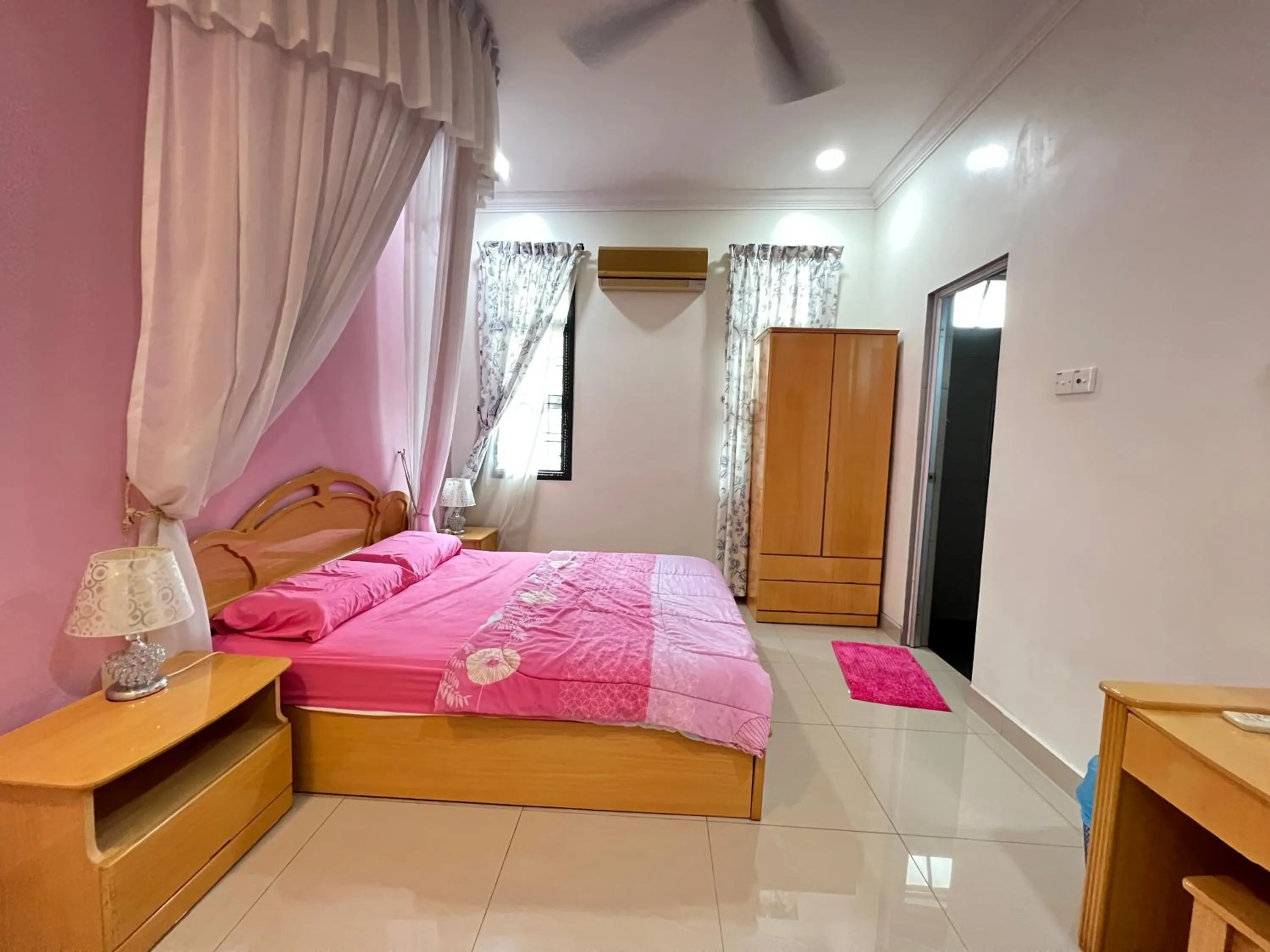 Bed in Jiaxin Homestay - Desa Terbau 家馨民宿