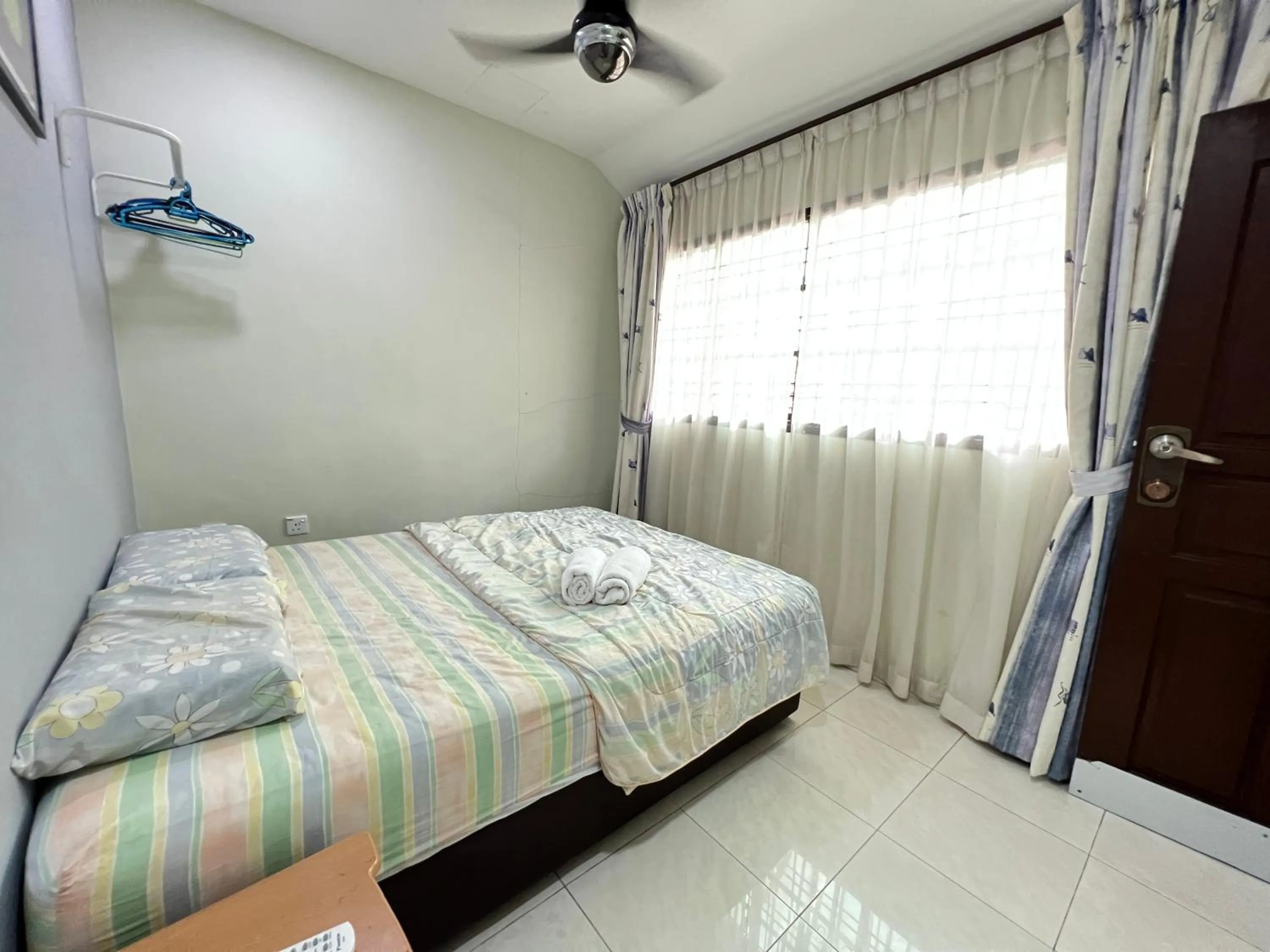 Bed in Jiaxin Homestay - Desa Terbau 家馨民宿