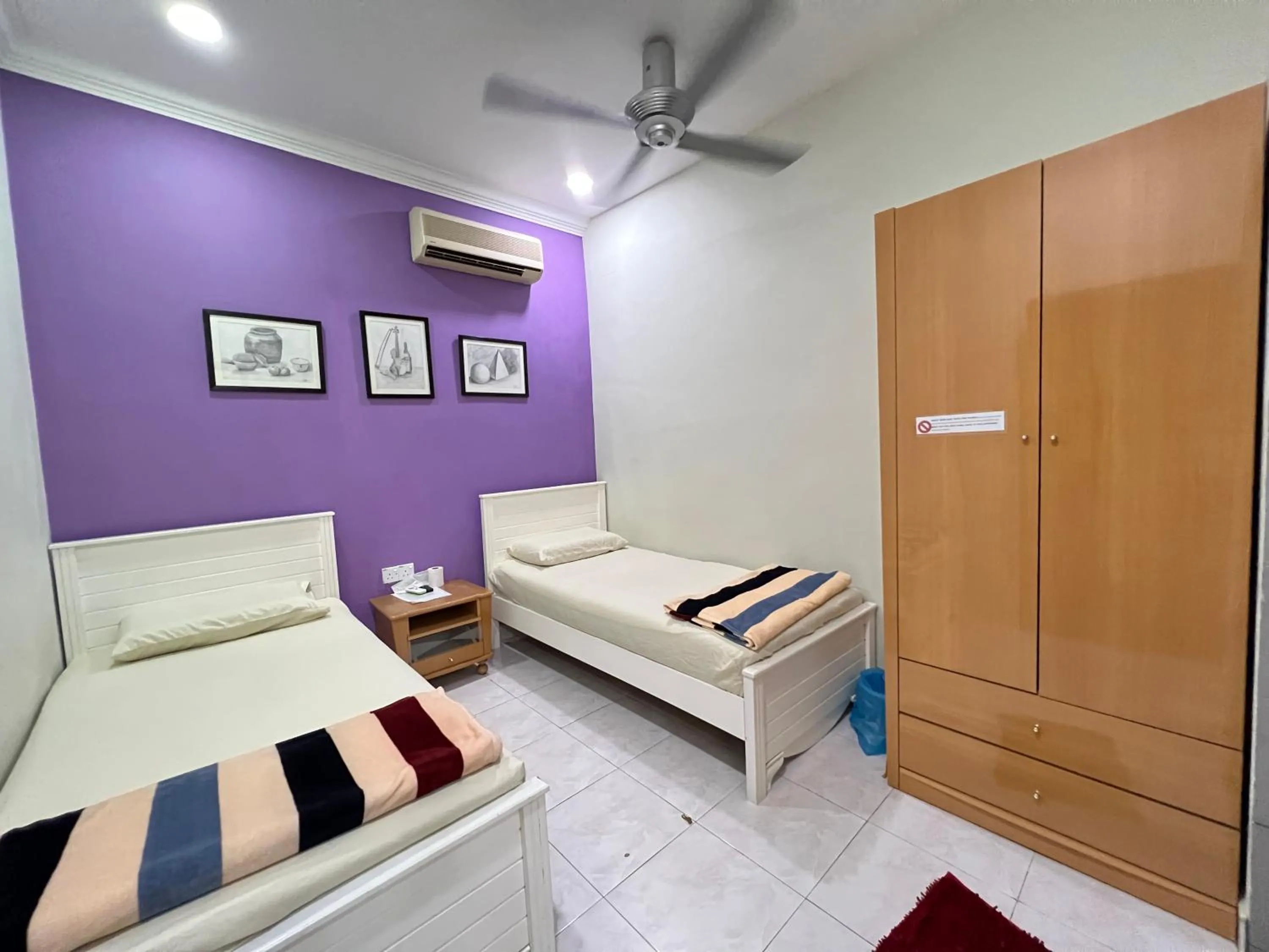 Bed in Jiaxin Homestay - Desa Terbau 家馨民宿