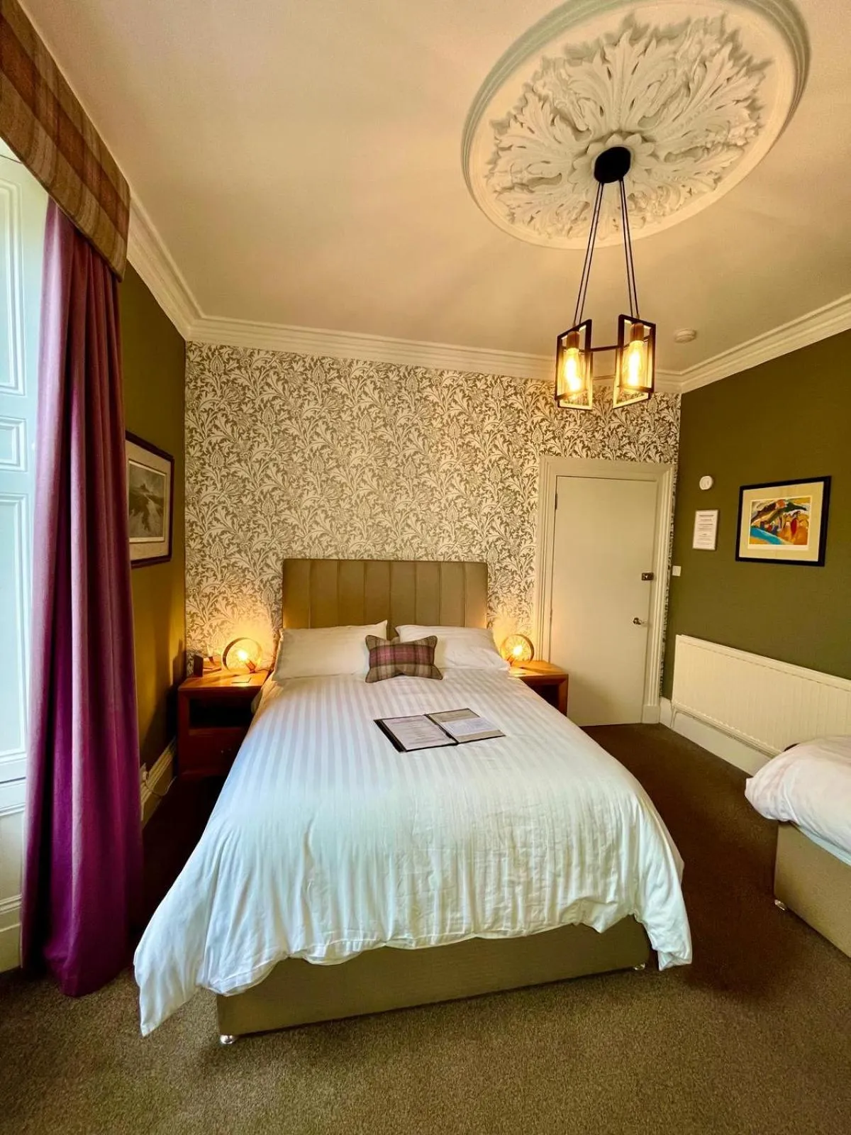 Bed in Ravenswood Guest House