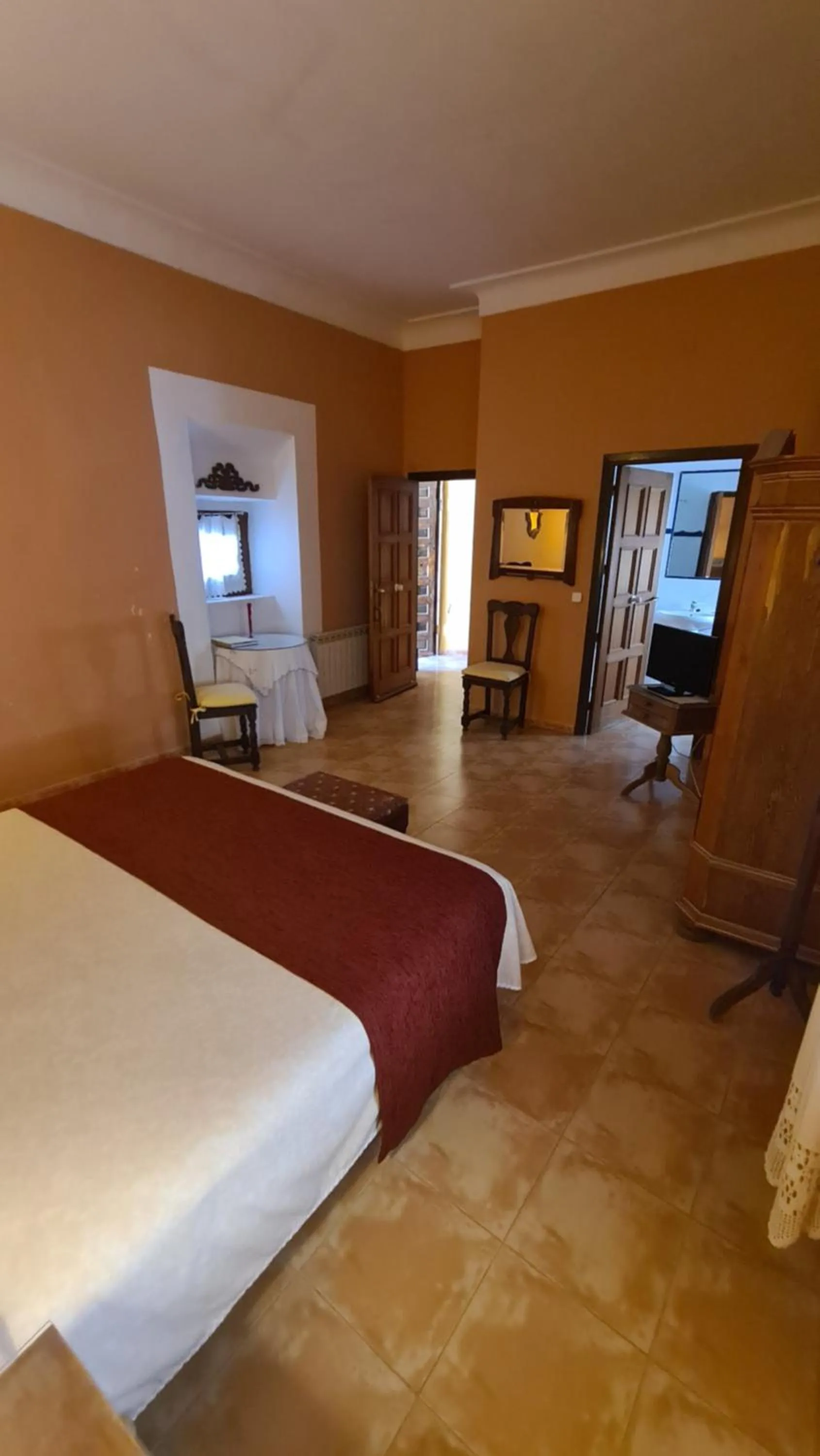 Bedroom, Bed in Casa Palacio Conde de Garcinarro