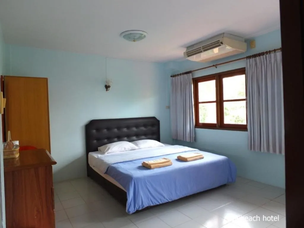 Bed in Royal Beach Guest House