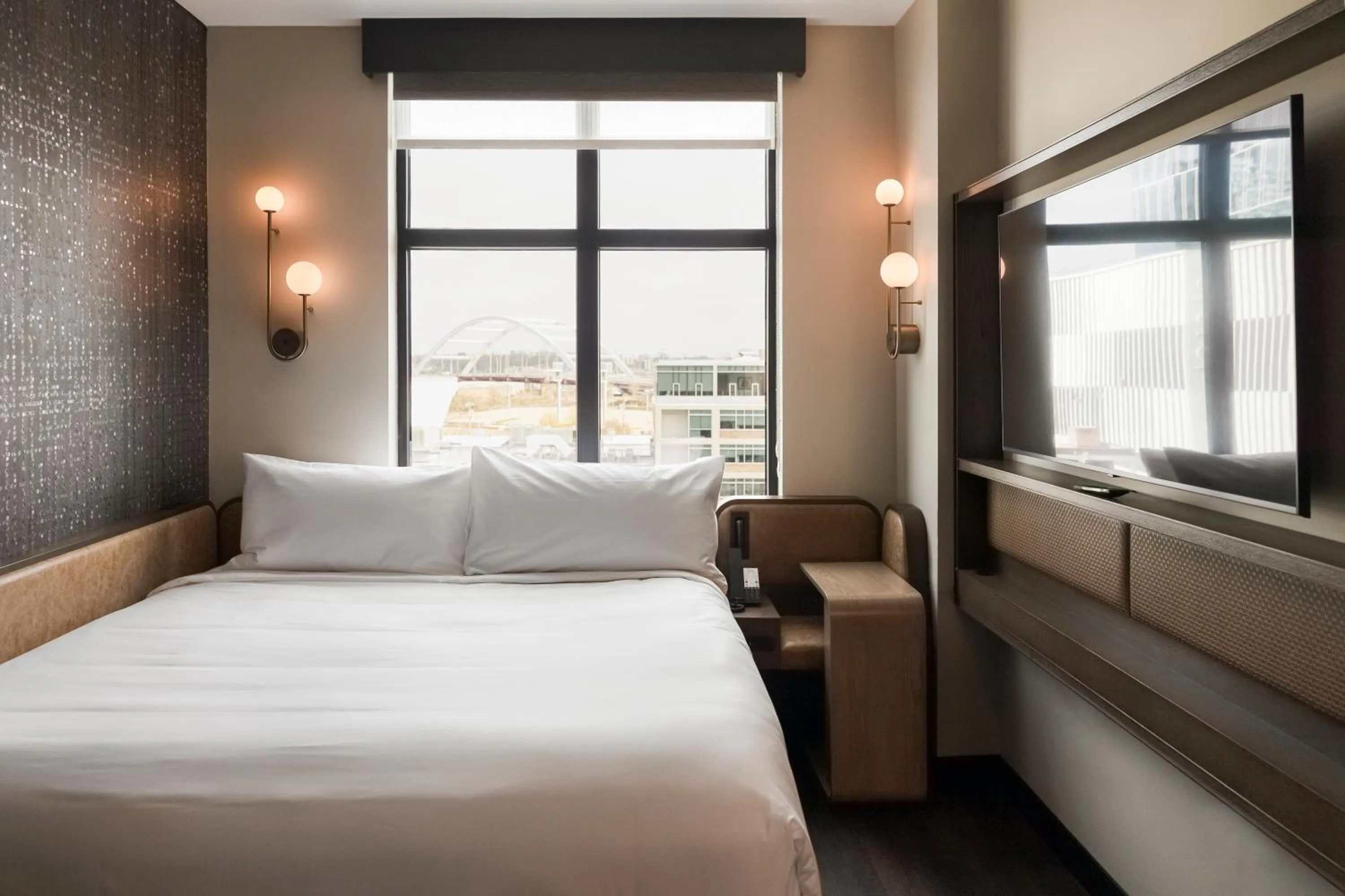 Bed in Motto By Hilton Nashville Downtown