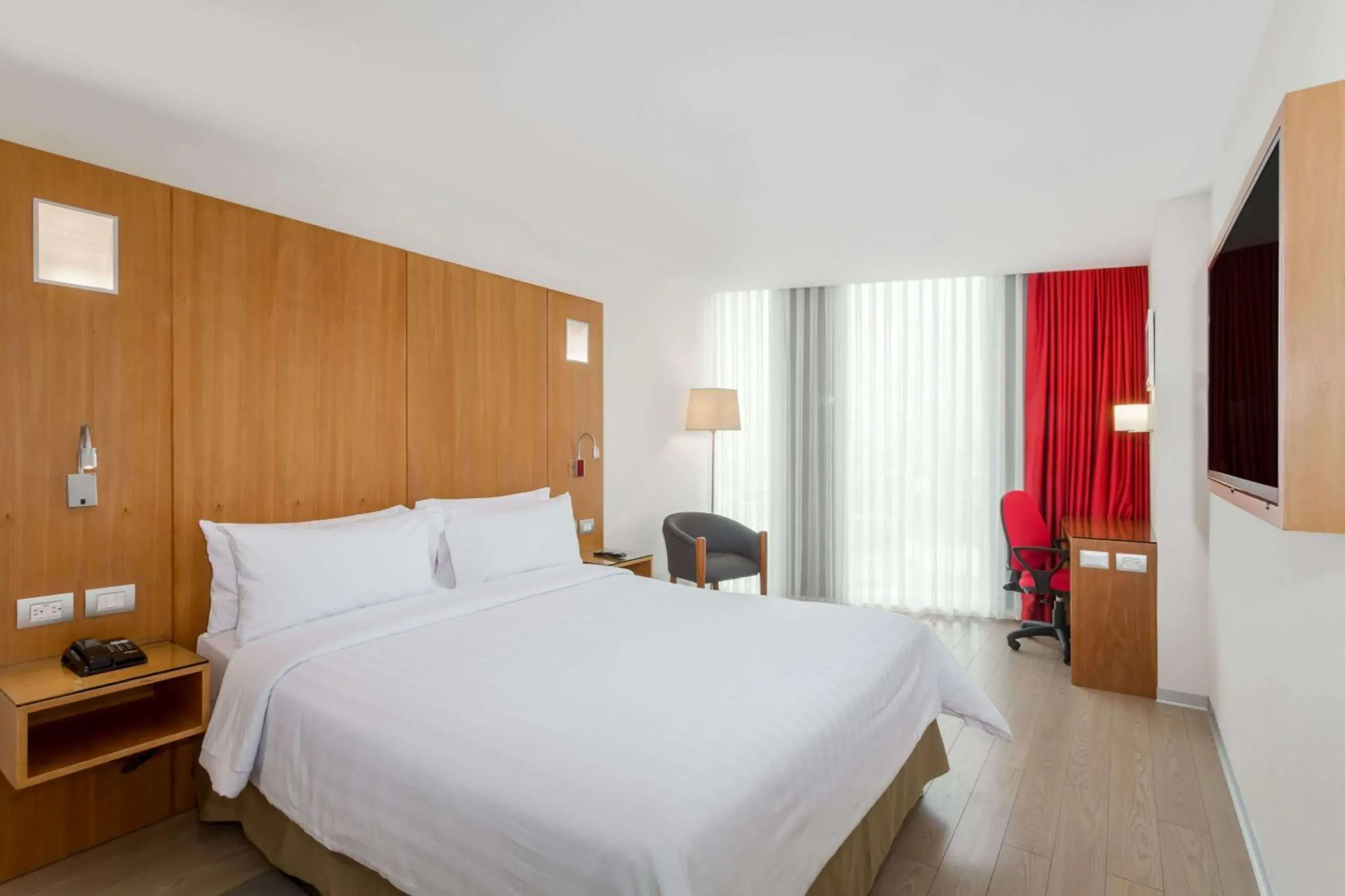Photo of the whole room, Bed in Ramada Encore by Wyndham Lima San Isidro Photo of the whole room, Bed in Ramada Encore by Wyndham Lima San Isidro