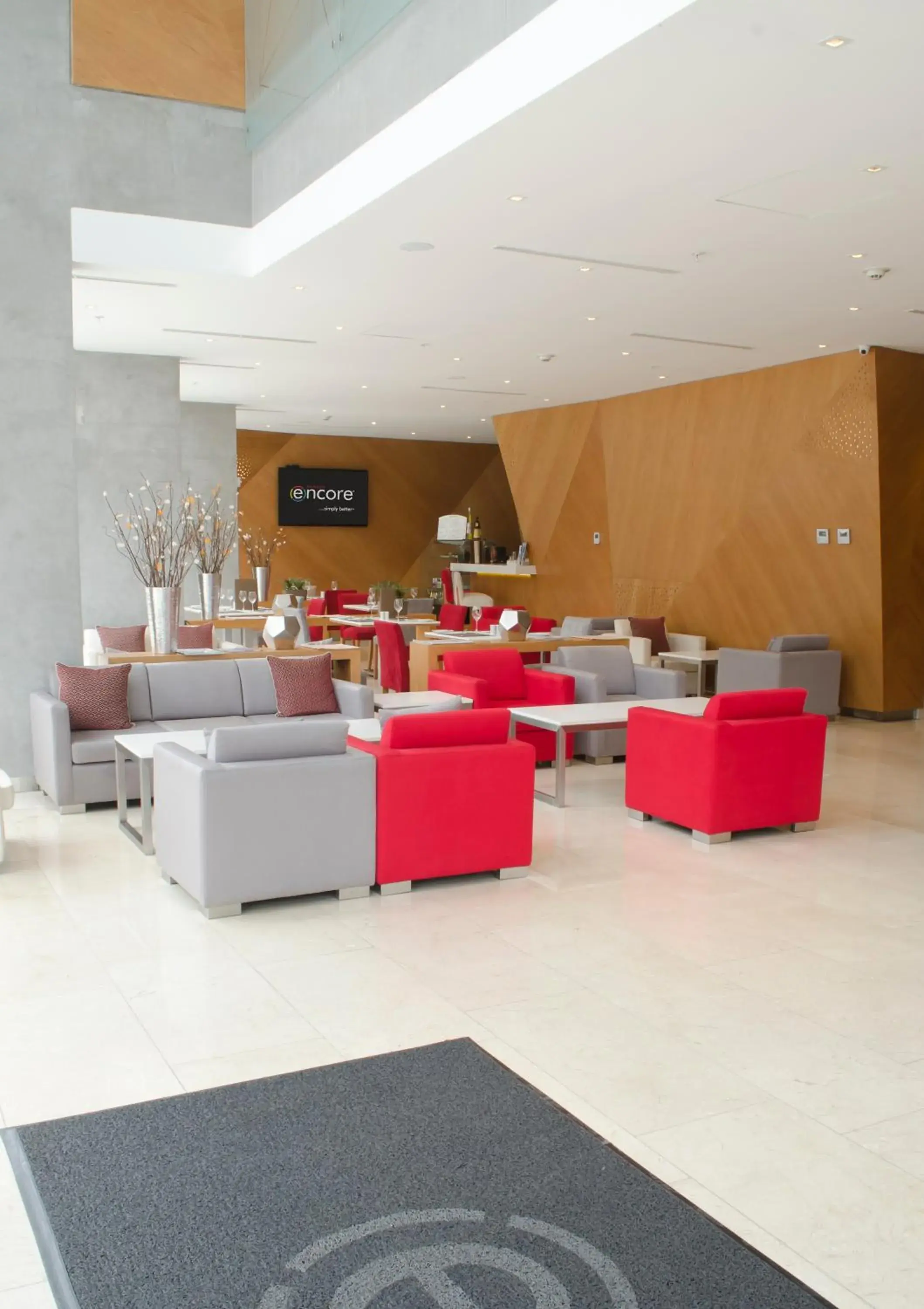 Lobby or reception in Ramada Encore by Wyndham Lima San Isidro Lobby or reception in Ramada Encore by Wyndham Lima San Isidro