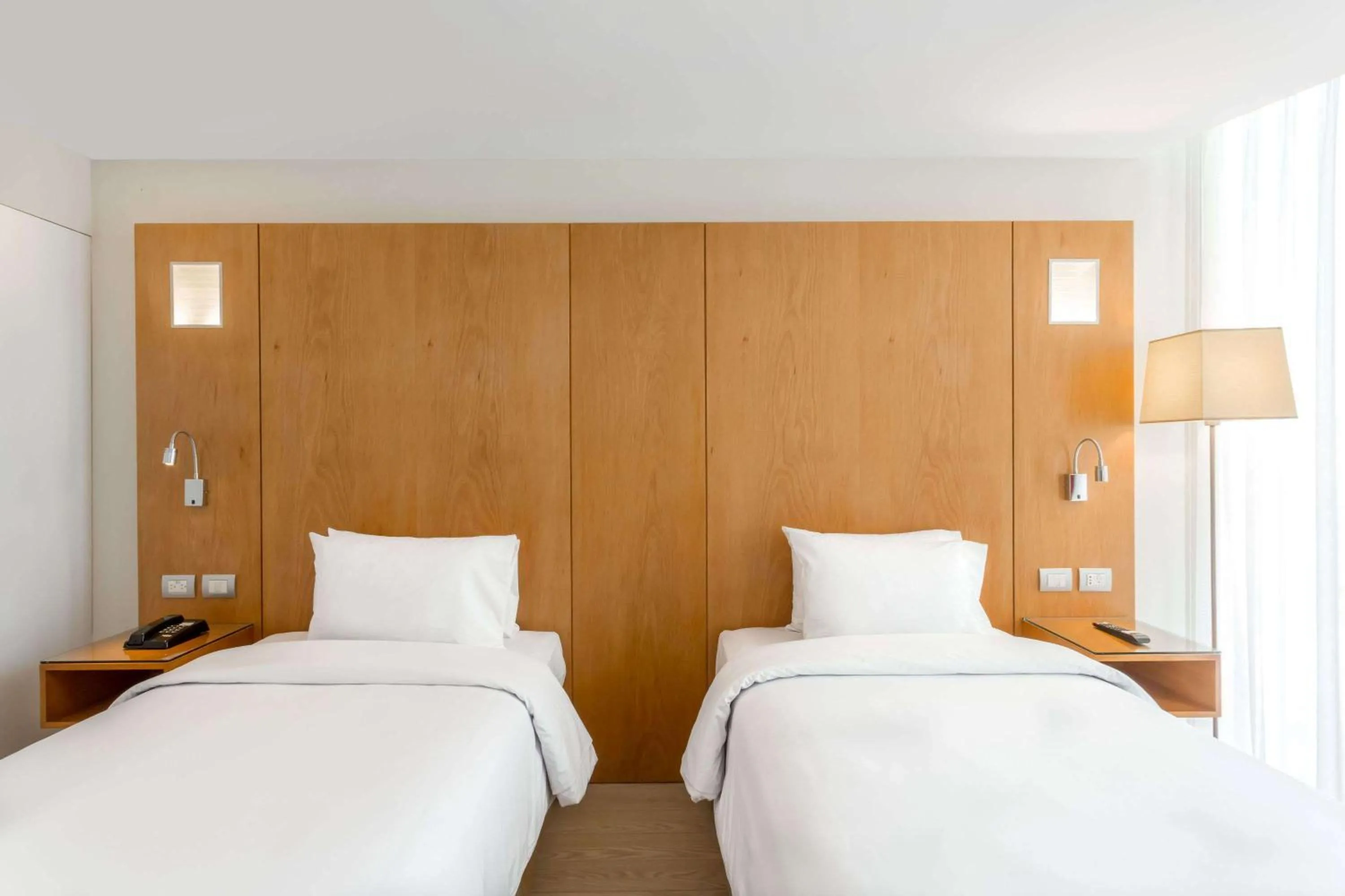 Photo of the whole room, Bed in Ramada Encore by Wyndham Lima San Isidro