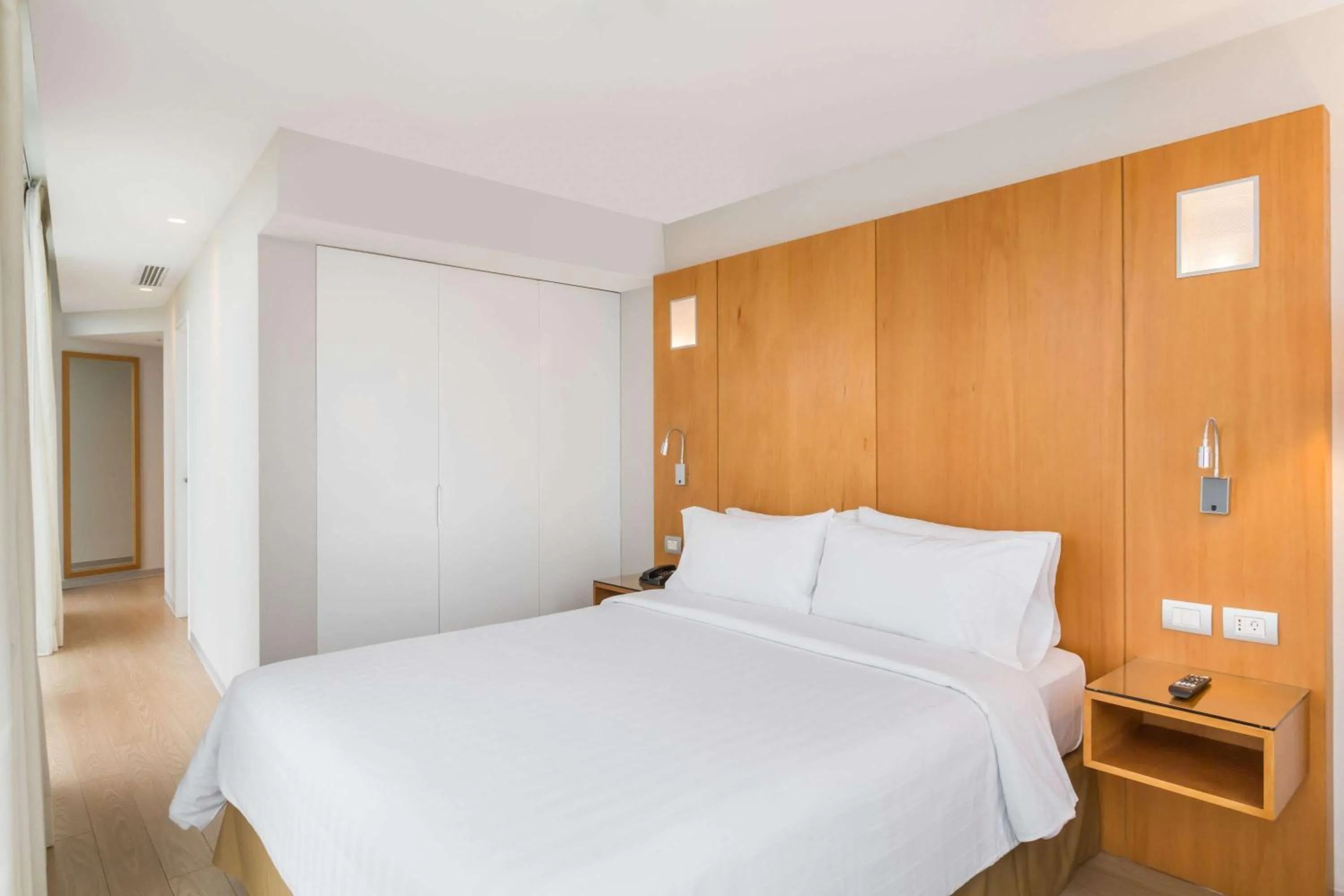 Photo of the whole room, Bed in Ramada Encore by Wyndham Lima San Isidro