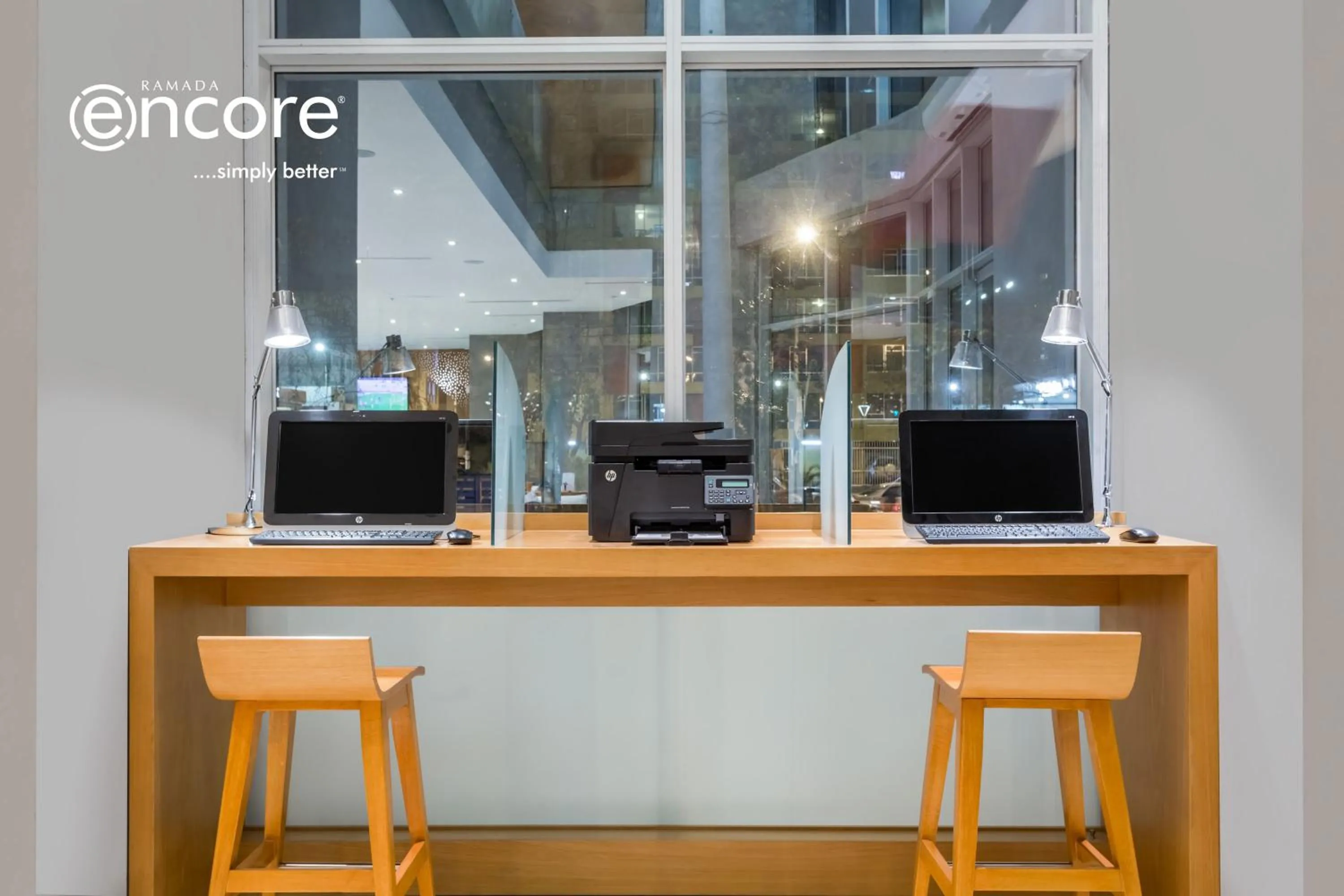 TV and multimedia in Ramada Encore by Wyndham Lima San Isidro