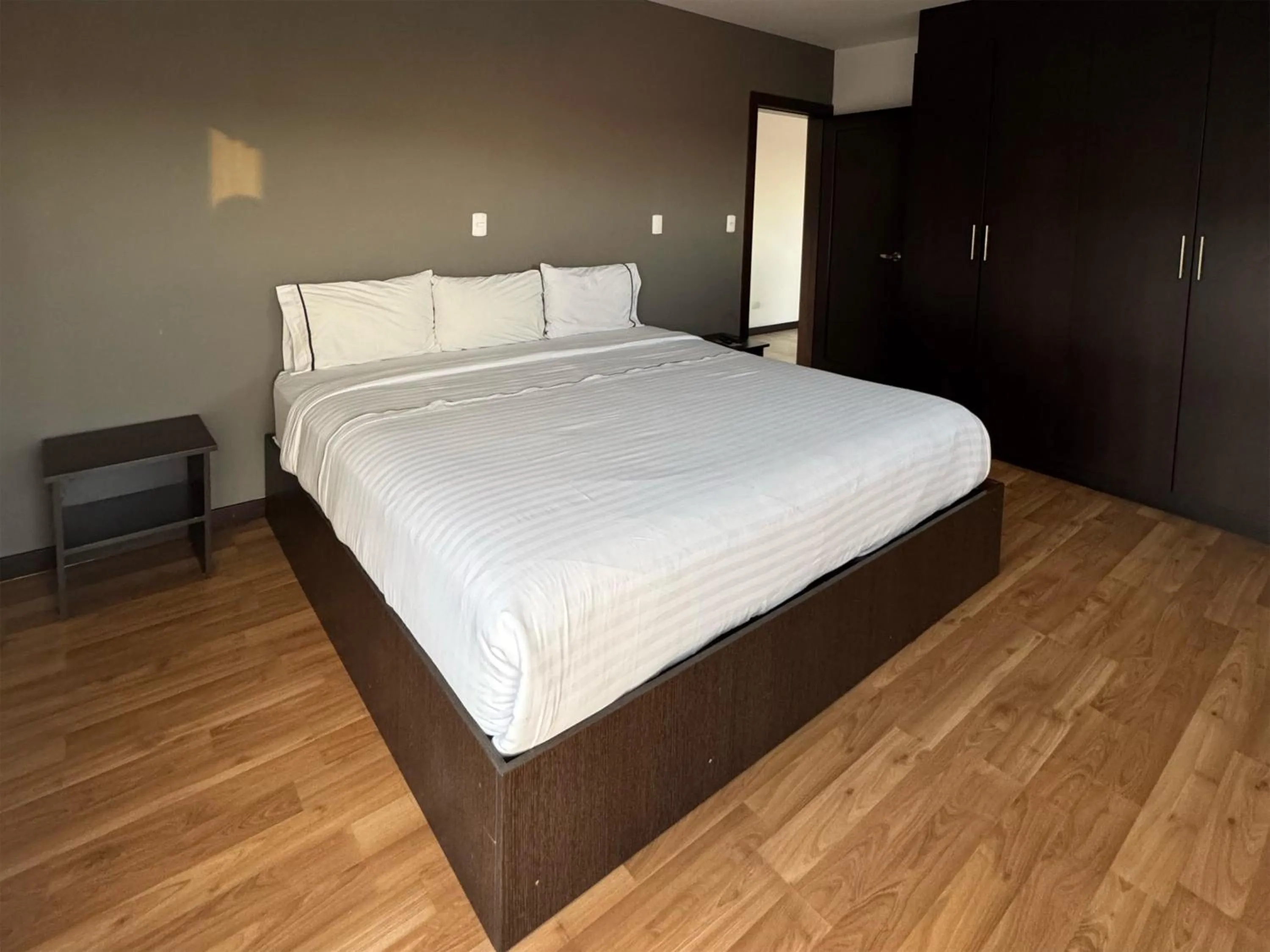 Bed in Gaviota Apartments & Suites