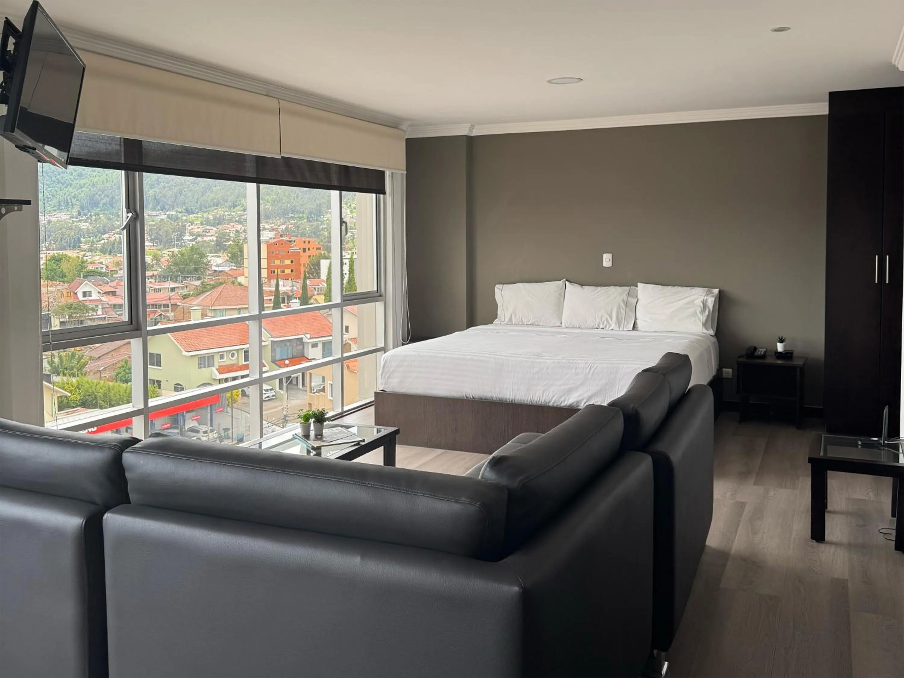 Living room, Bed in Gaviota Apartments & Suites