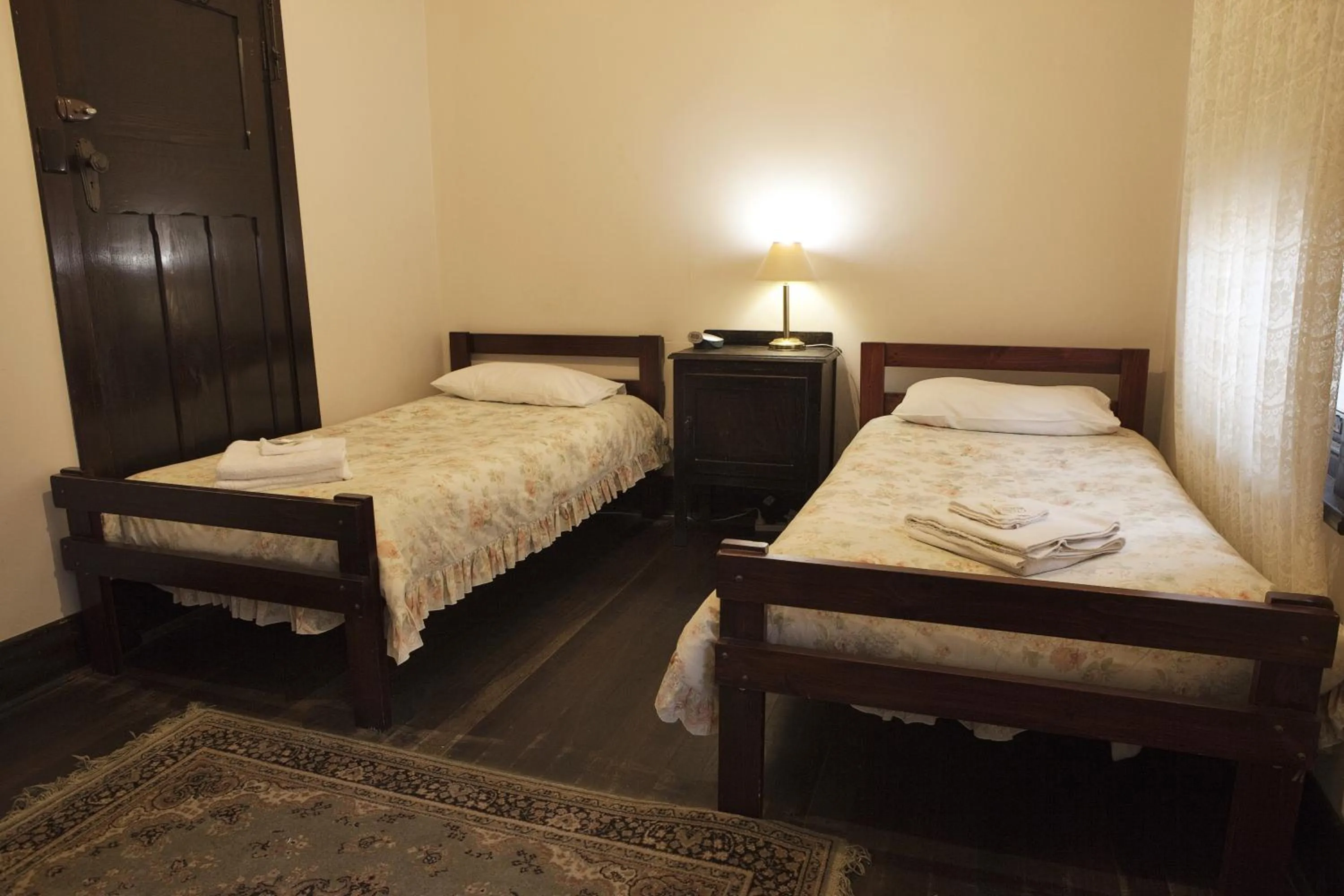 Bedroom in The Rising Sun Hotel