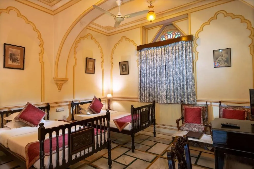 Photo of the whole room, Bed in Hotel Narain Niwas Palace