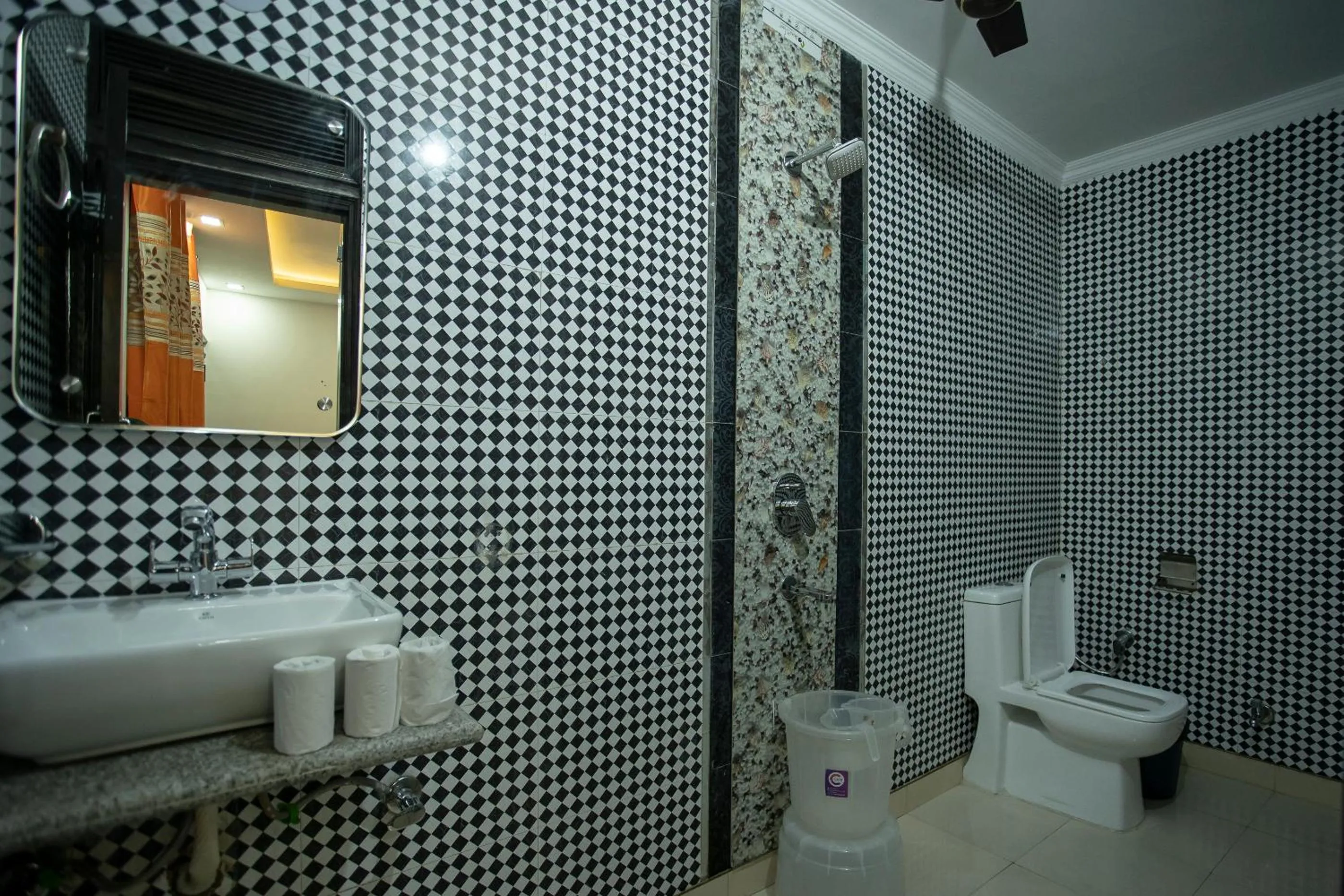Bathroom in Hotel Yes Boss International- Awarded Best Hotel 2025 in Budget Category