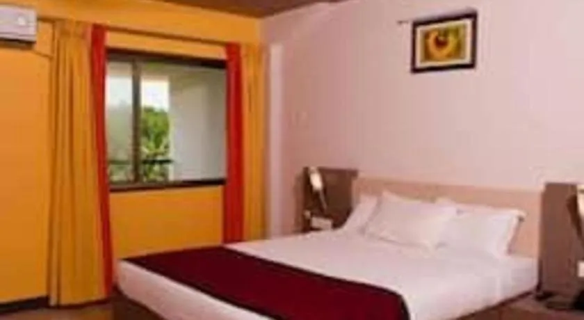 Bed in Hotel Colva Kinara