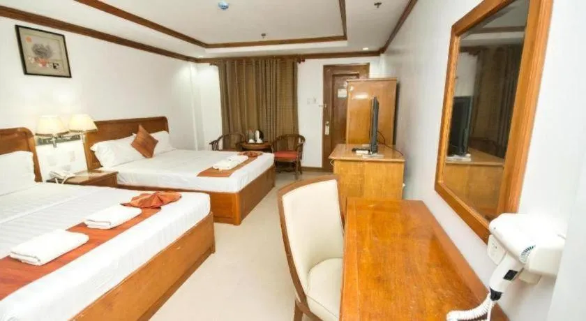 Bed in Grand Boracay Resort