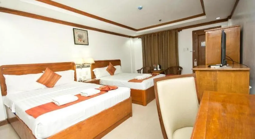 Bed in Grand Boracay Resort
