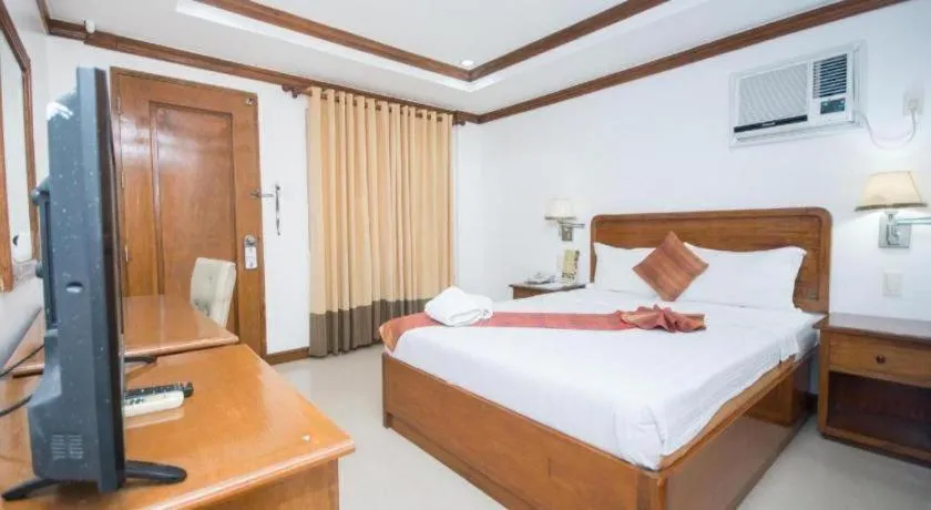 Bed in Grand Boracay Resort