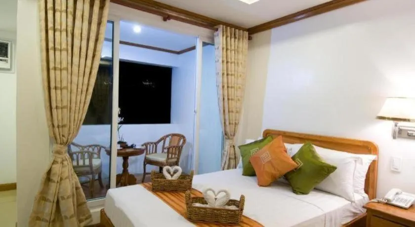 Bed in Grand Boracay Resort