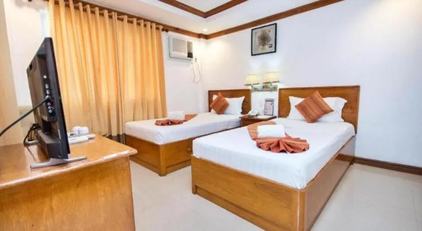 Bed in Grand Boracay Resort