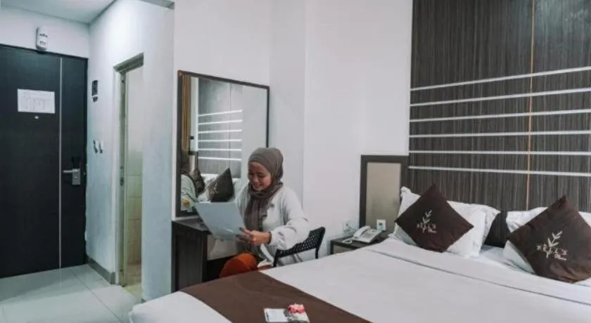 Bed in Bell's Place Hotel