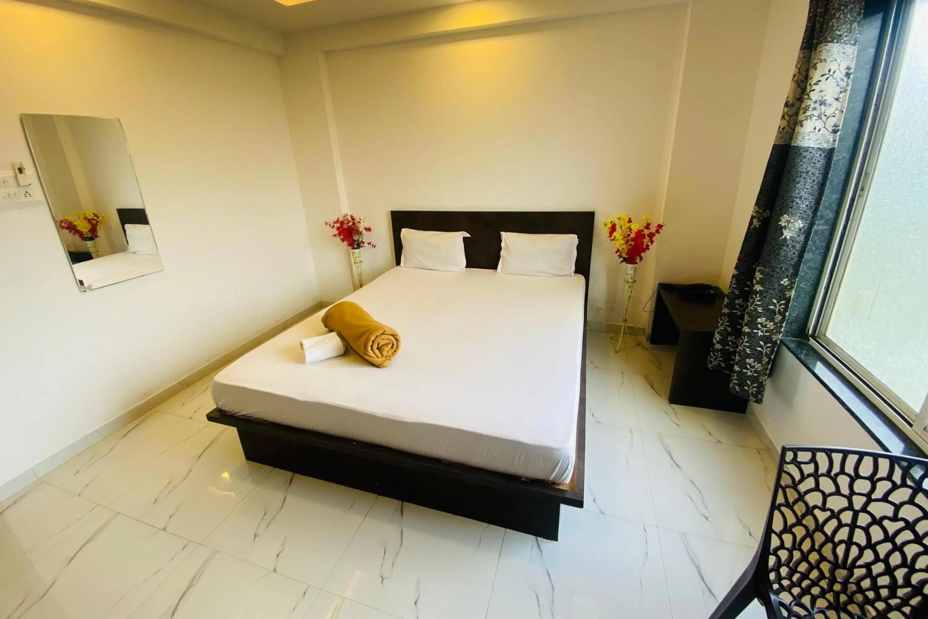 Bed in Sai Vishwa Lodging